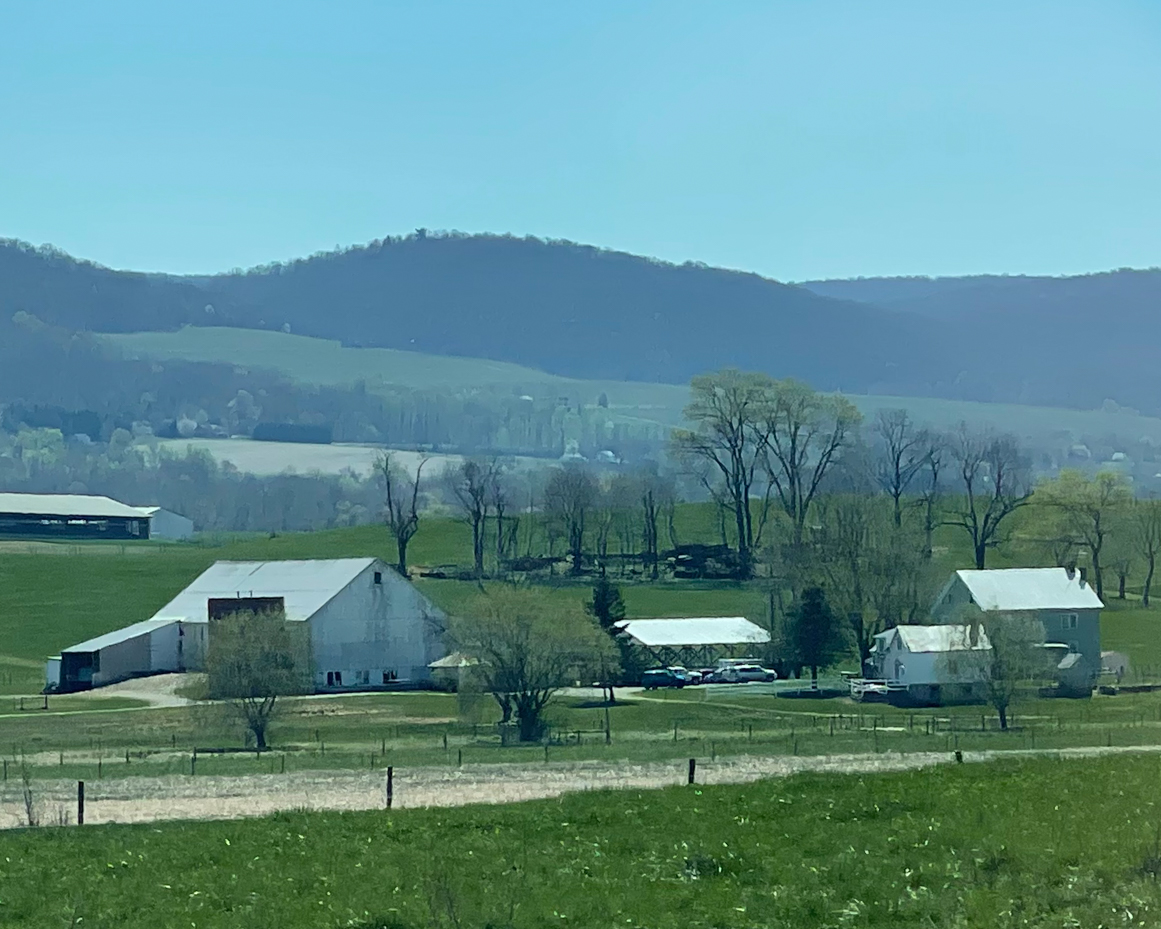 farm-with-rolling-hills