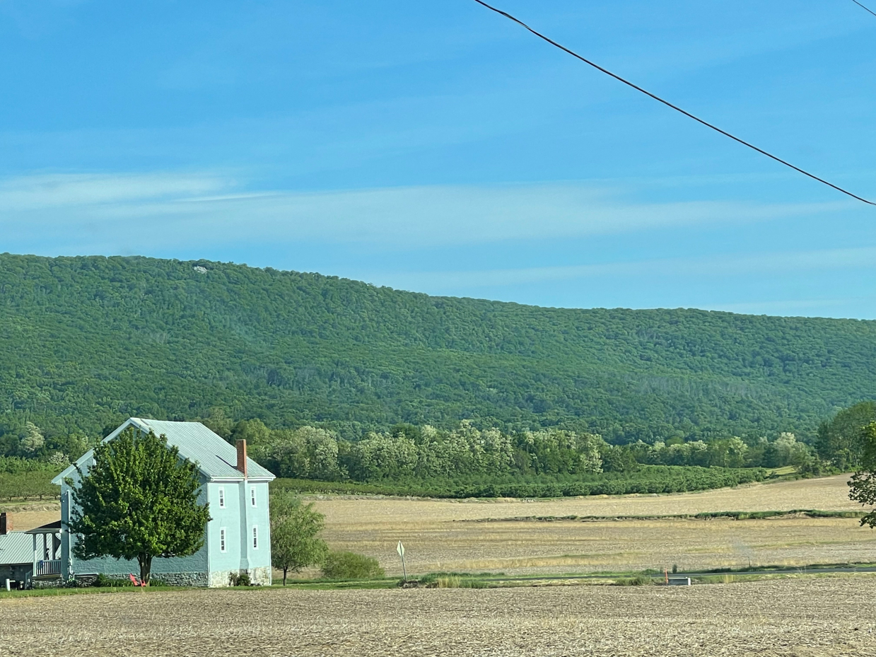 farmhouse-with-farm-fields