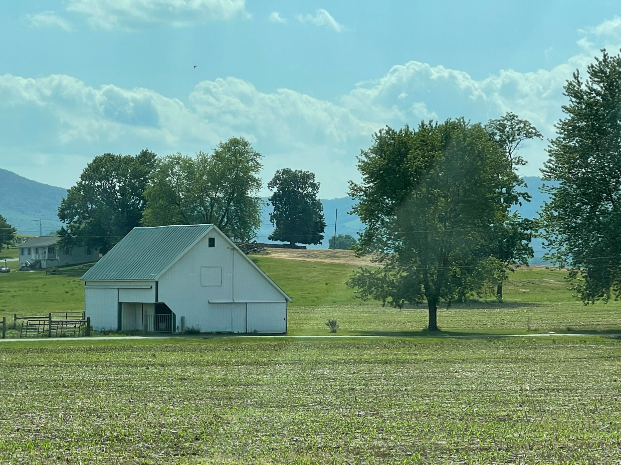 barn-with-trees-and-clouds