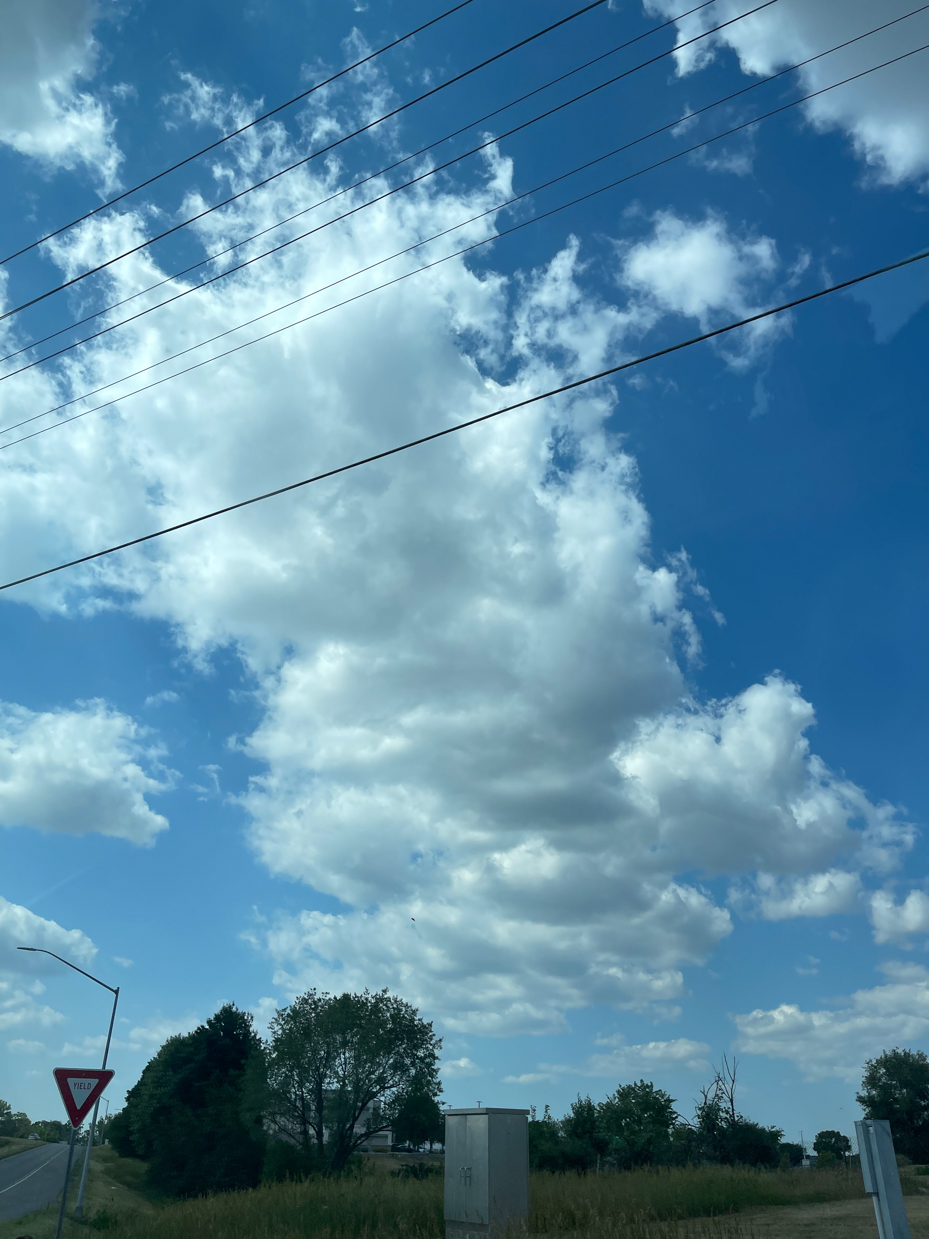 clouds-in-sky-with-trees-and-power-lines