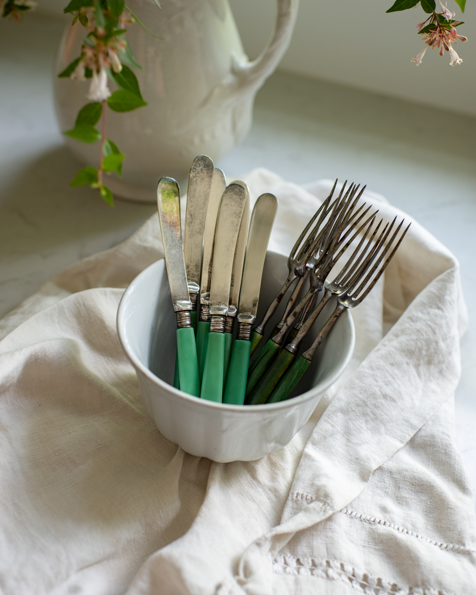 green-fork-and-knife-in-bowl