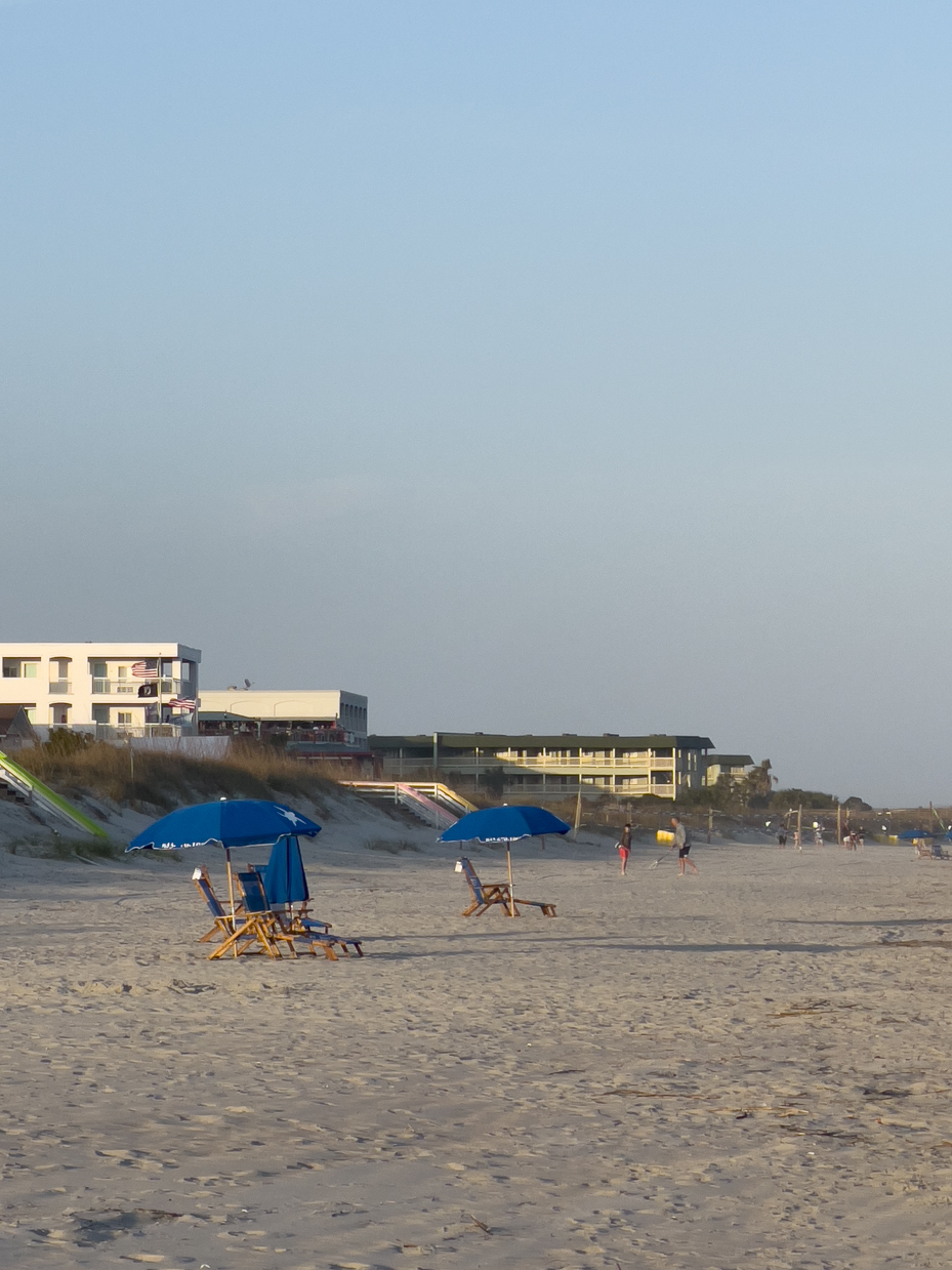 buildings-and-chairs-on-beach