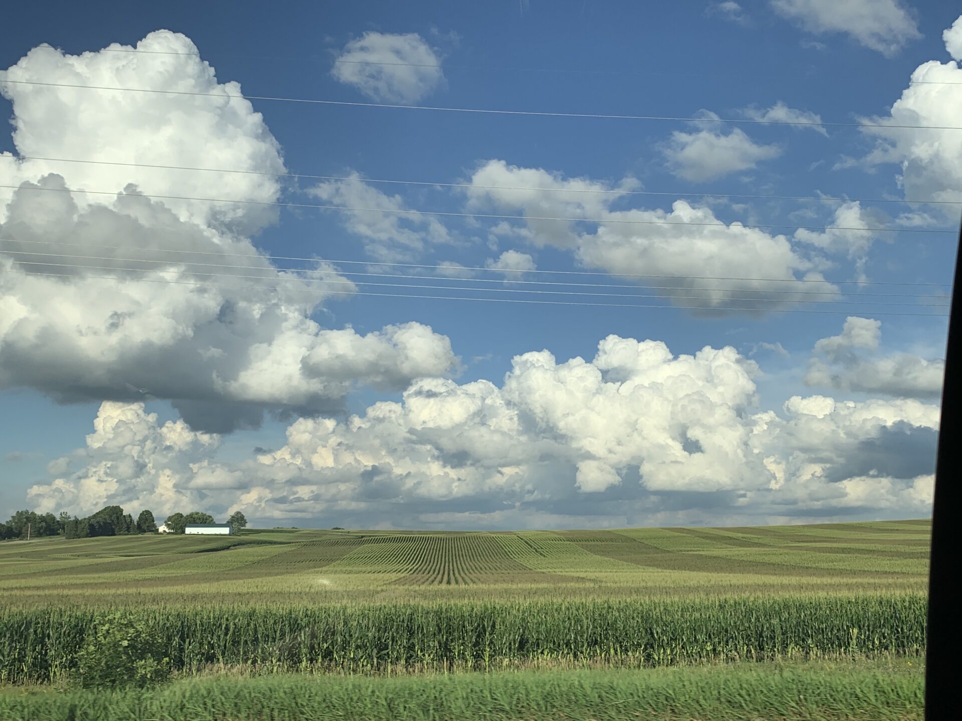 large-clouds-over-farm-fields