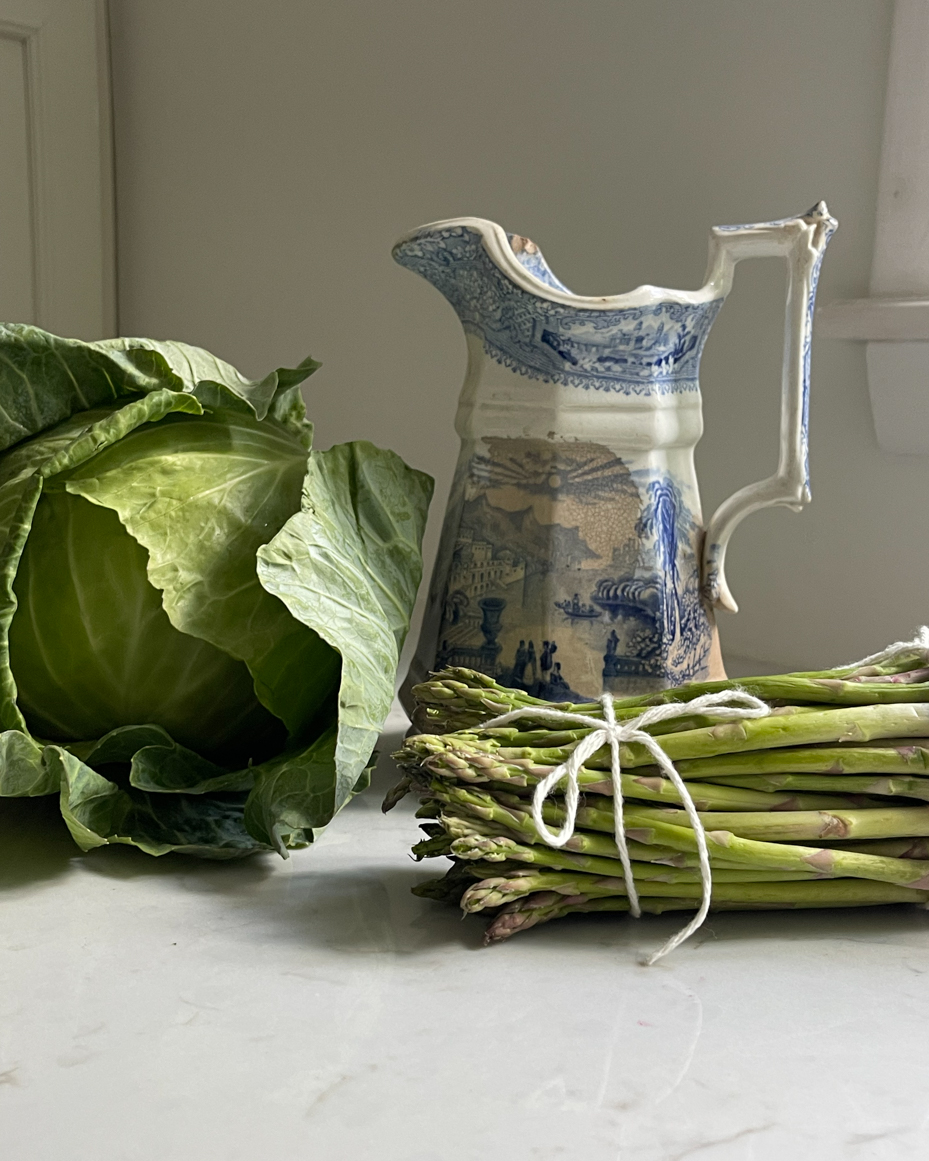 pitcher-next-to-cabbage-and-asparagus