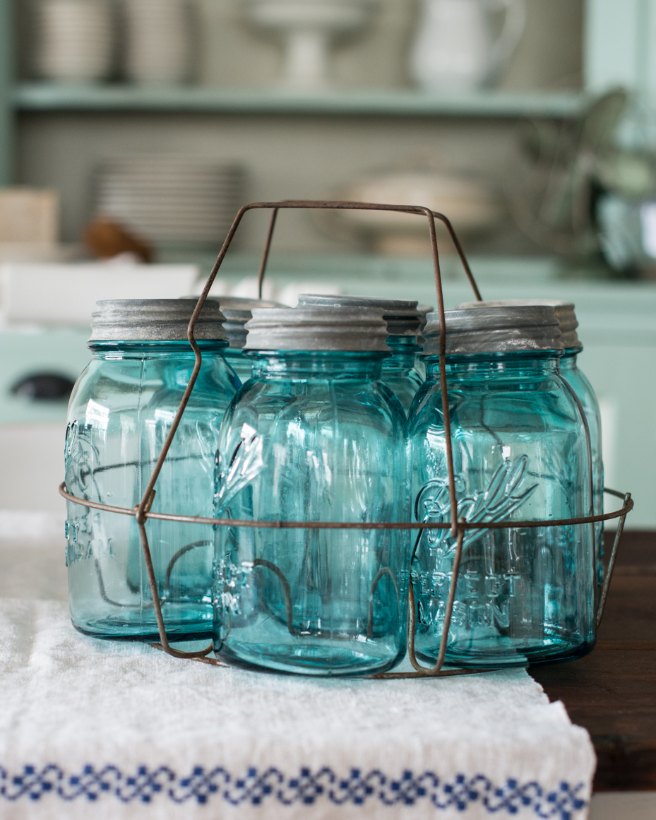 blue-mason-jars-in-basket