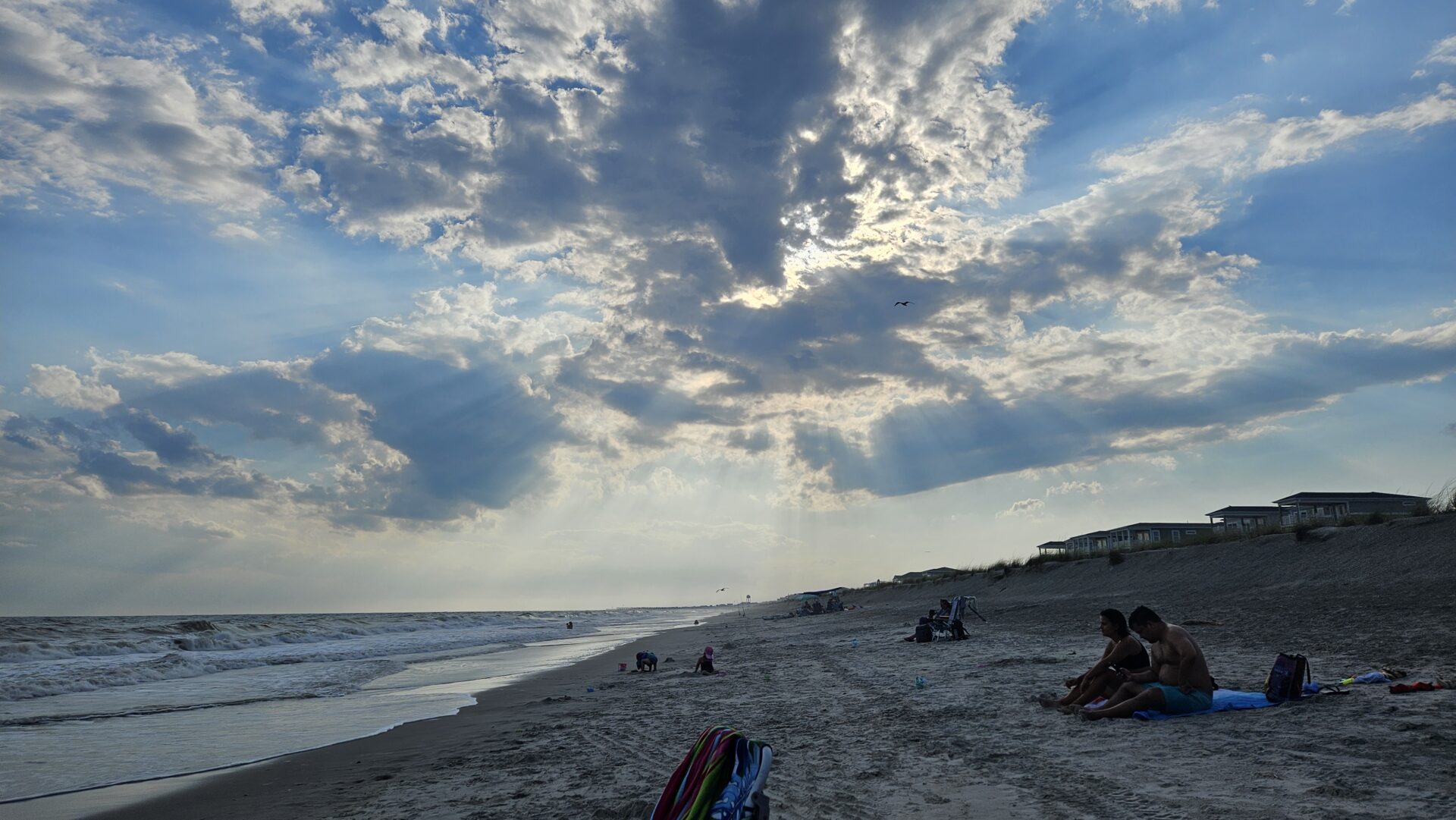 oak-island-nc-clouds-with-rays-of-sun