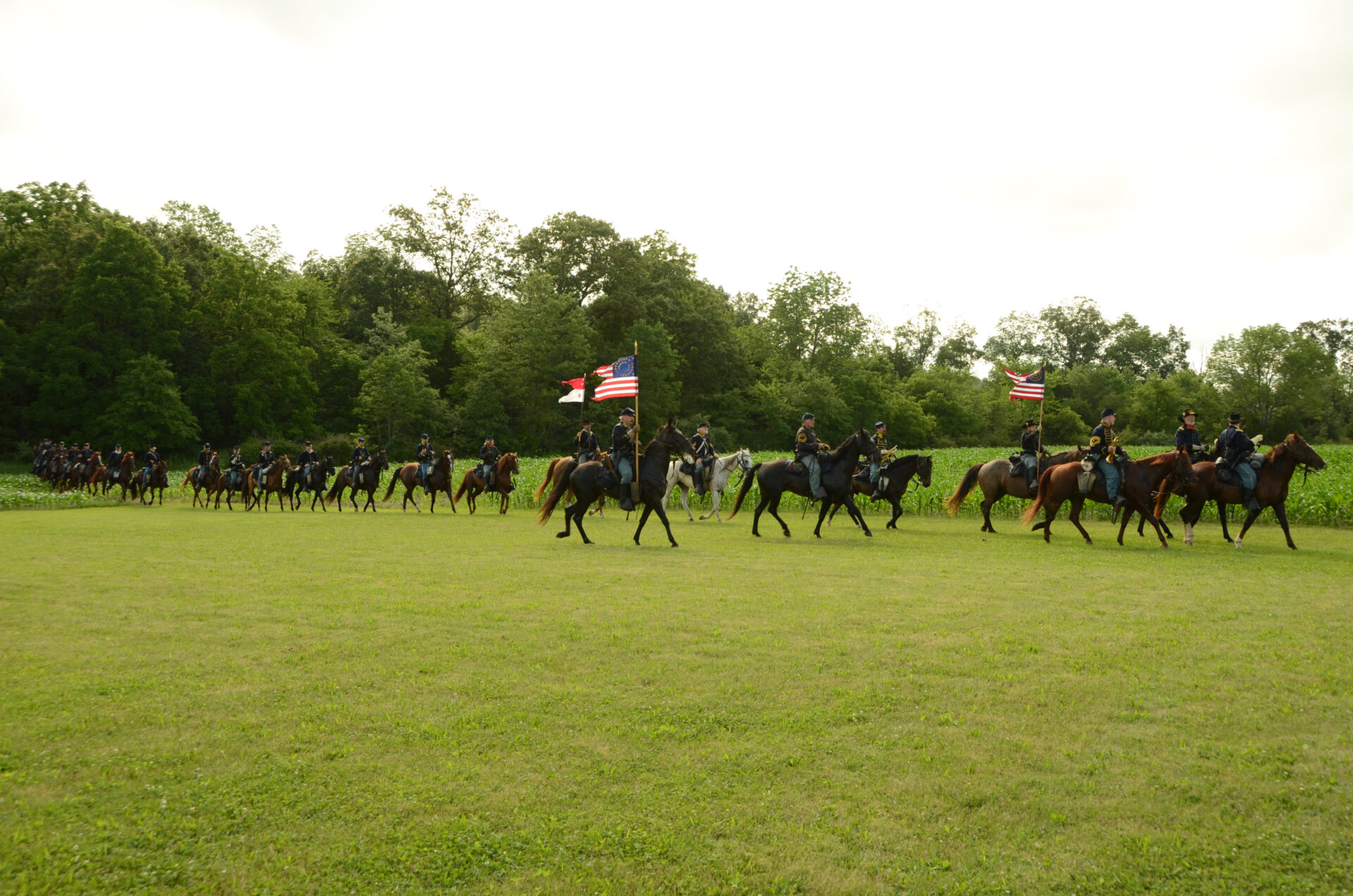 civil-war-cavalry-reenactment-with-historical-flags