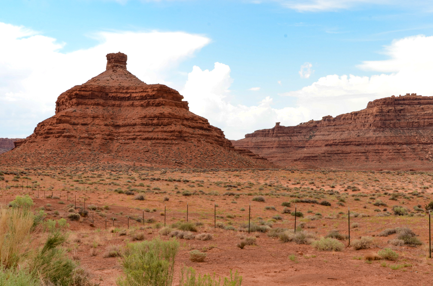 red-rock-butte-formation-in-desert-landscape-with-clear-sky