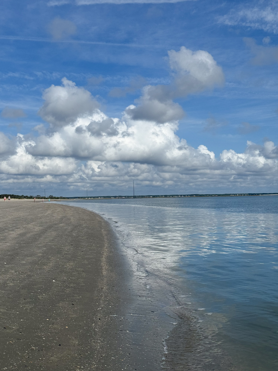 sand-and-ocean-with-clouds