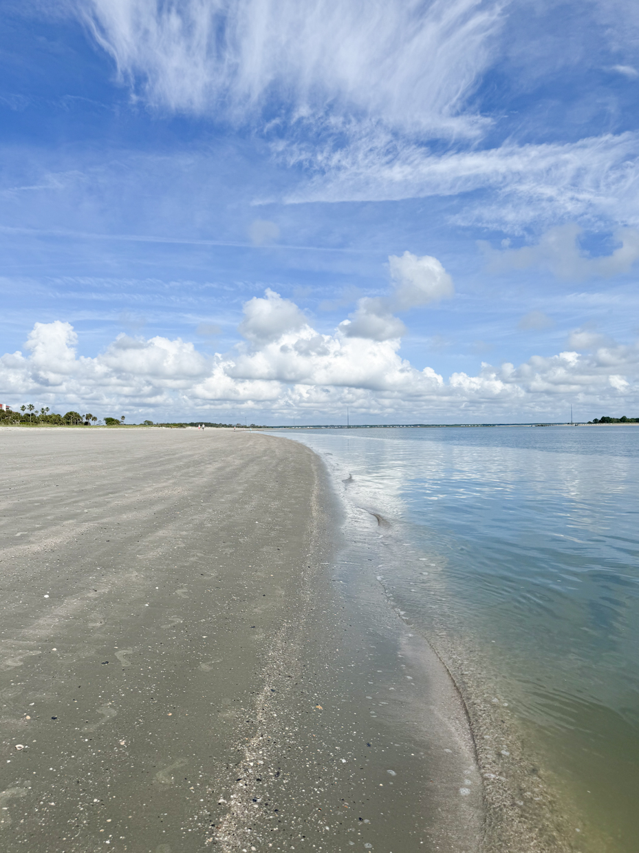 sand-and-ocean-with-clouds