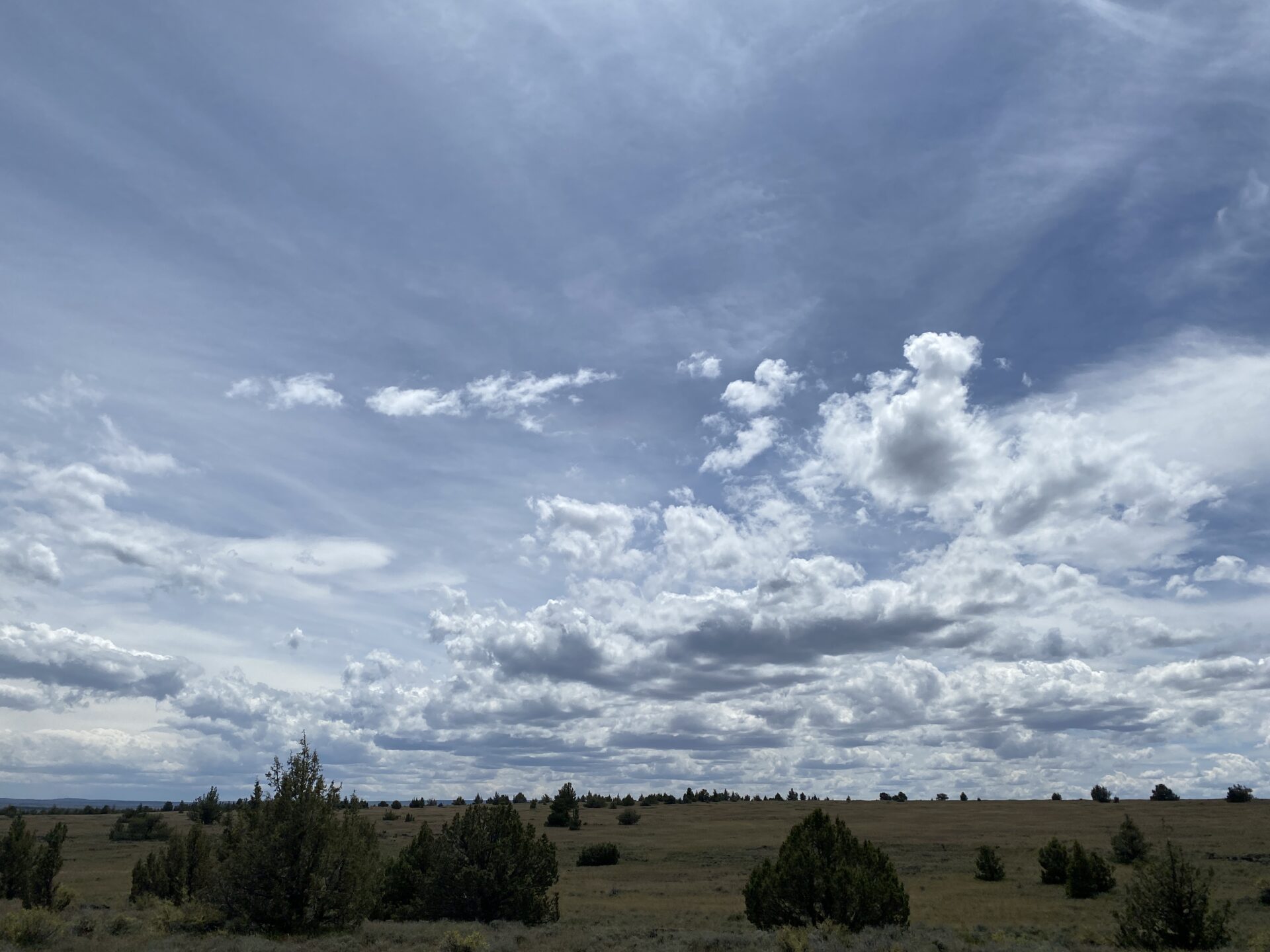 vast-remote-high-desert-terrain-with-stormy-cloudy-skies