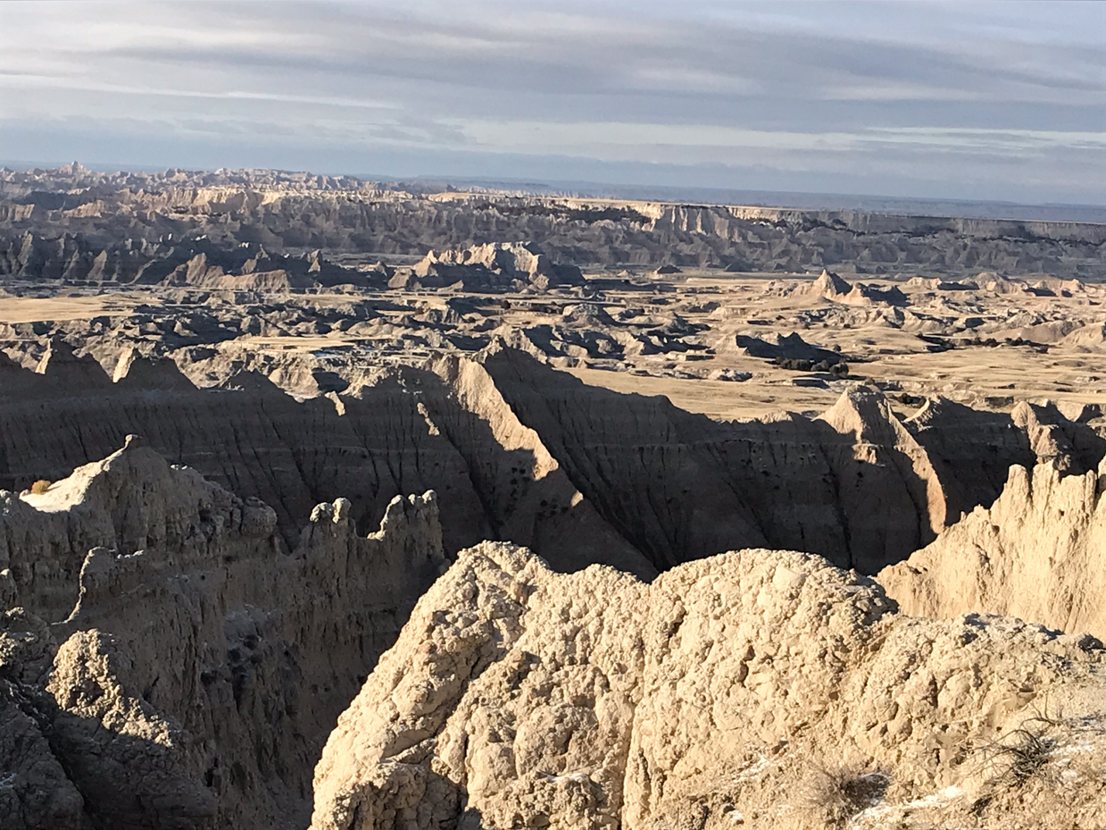 stunning-rocky-badlands-landscape-with-eroded-cliffs-and-canyon-views-royalty-free-nature-reference-photo-for-desert-terrain-geology-and-rugged-wilderness-photography