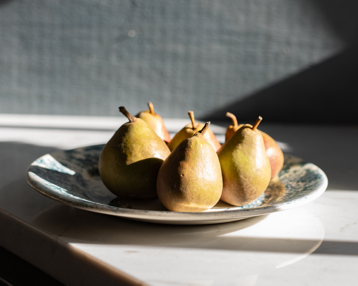 golden-pears-on-plate-in-natural-light-artist-reference-photo