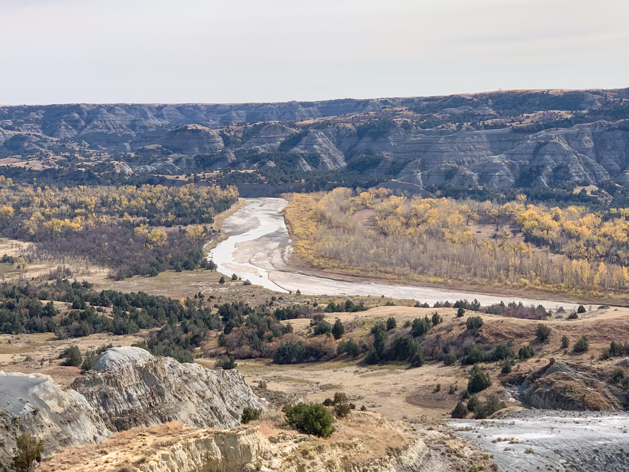 winding-river-through-badlands-autumn-landscape-western-vista-artist-reference-photo