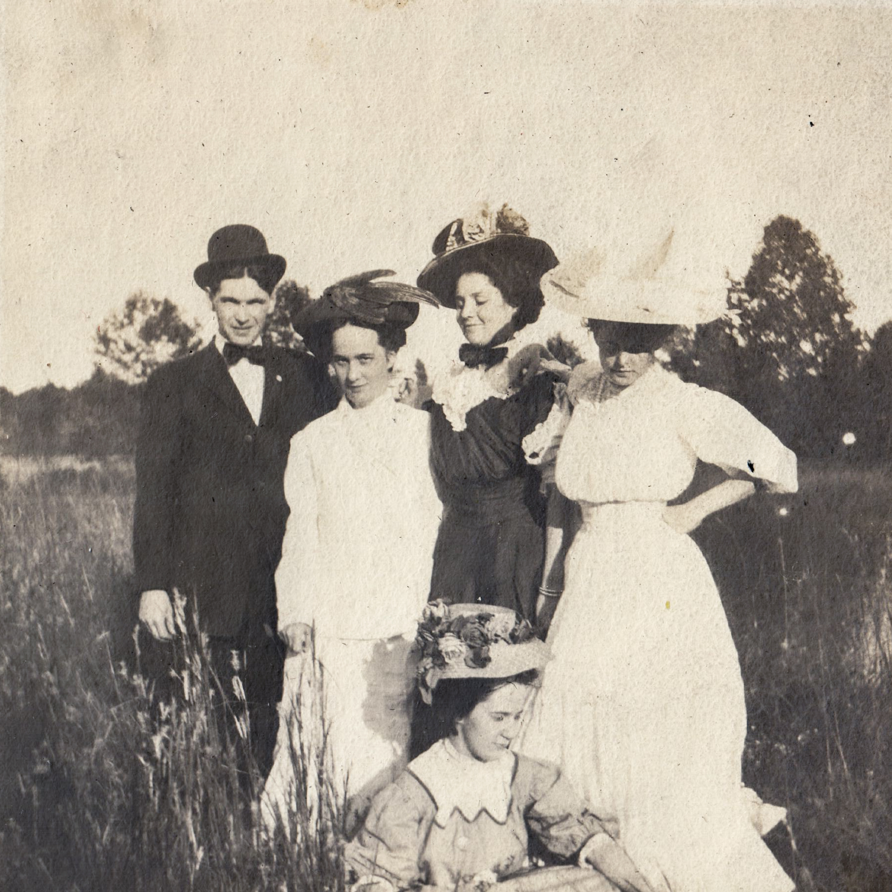 portrait-of-group-with-hats