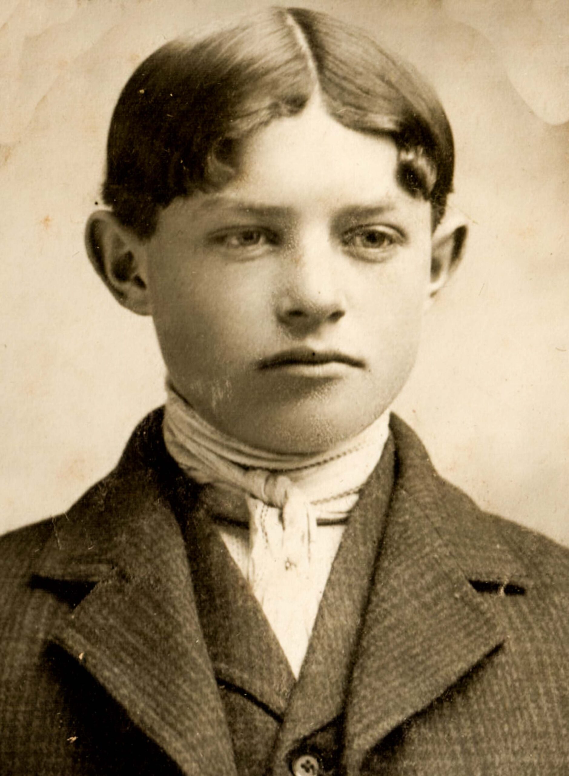 Edwardian Era Portrait of Young Boy with Center-Parted Hair Early 1900s Vintage Photography artist reference photo