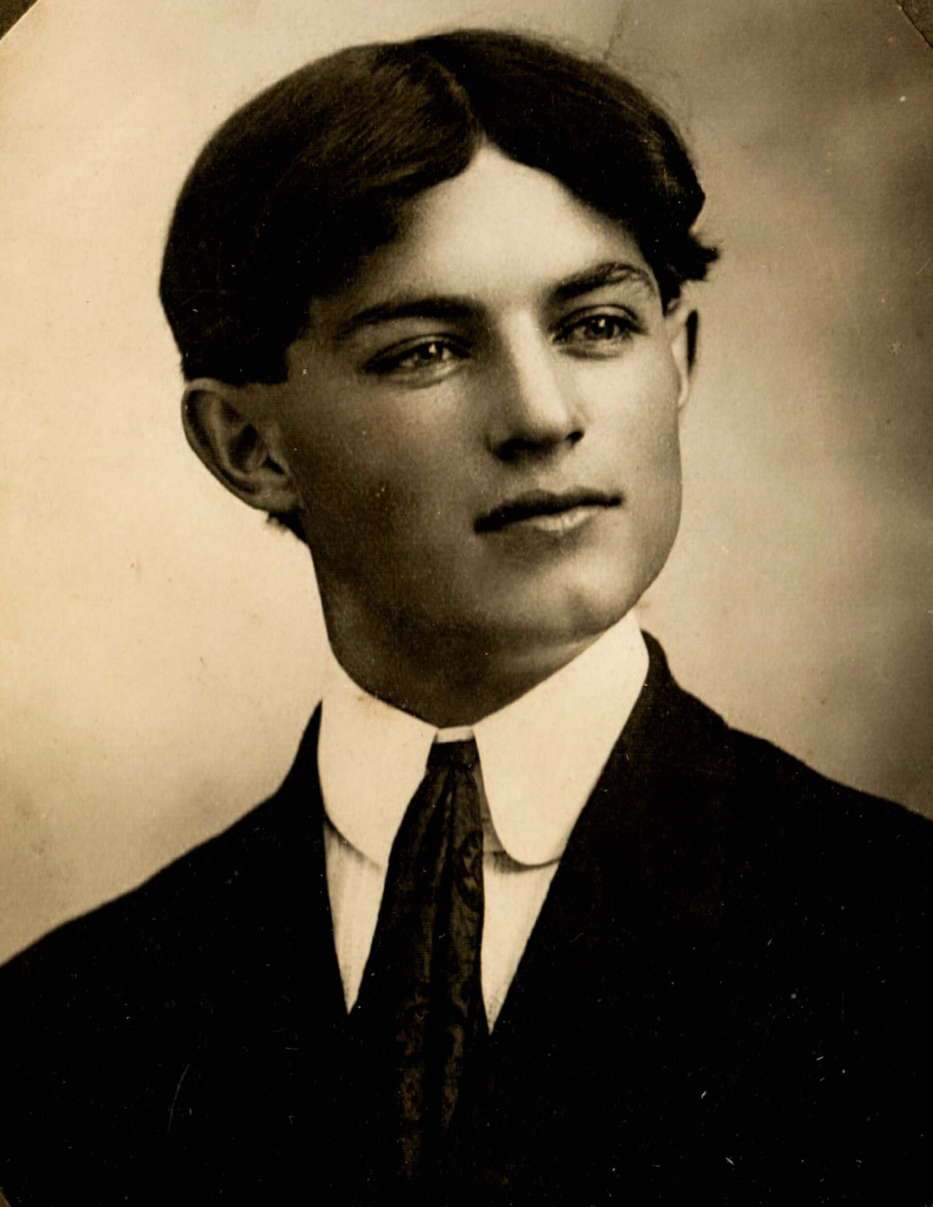 edwardian-era-portrait-of-young-man-with-center-parted-hair-early-1900s-vintage-photography