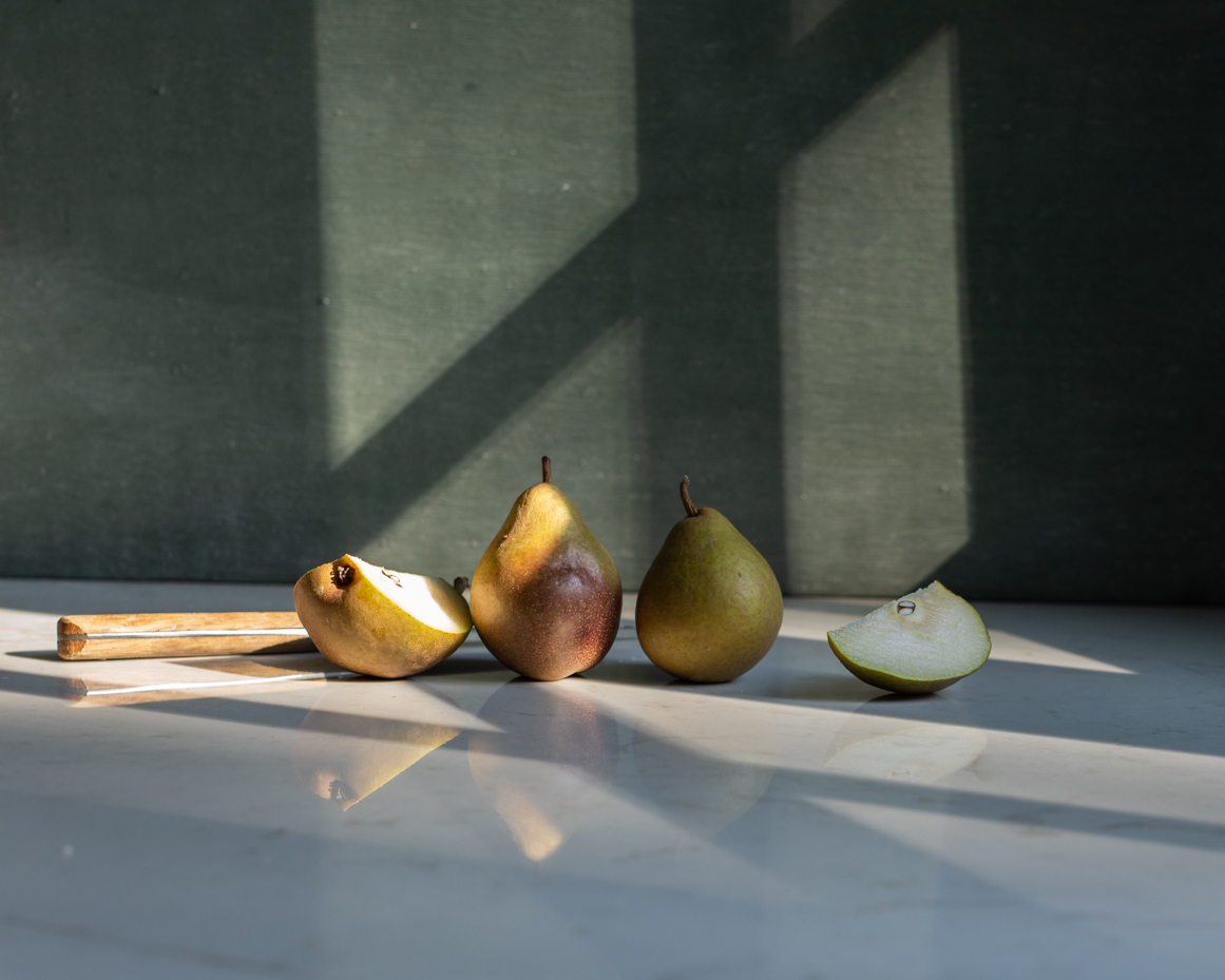 fresh-pears-with-natural-light-and-shadow-rustic-still-life