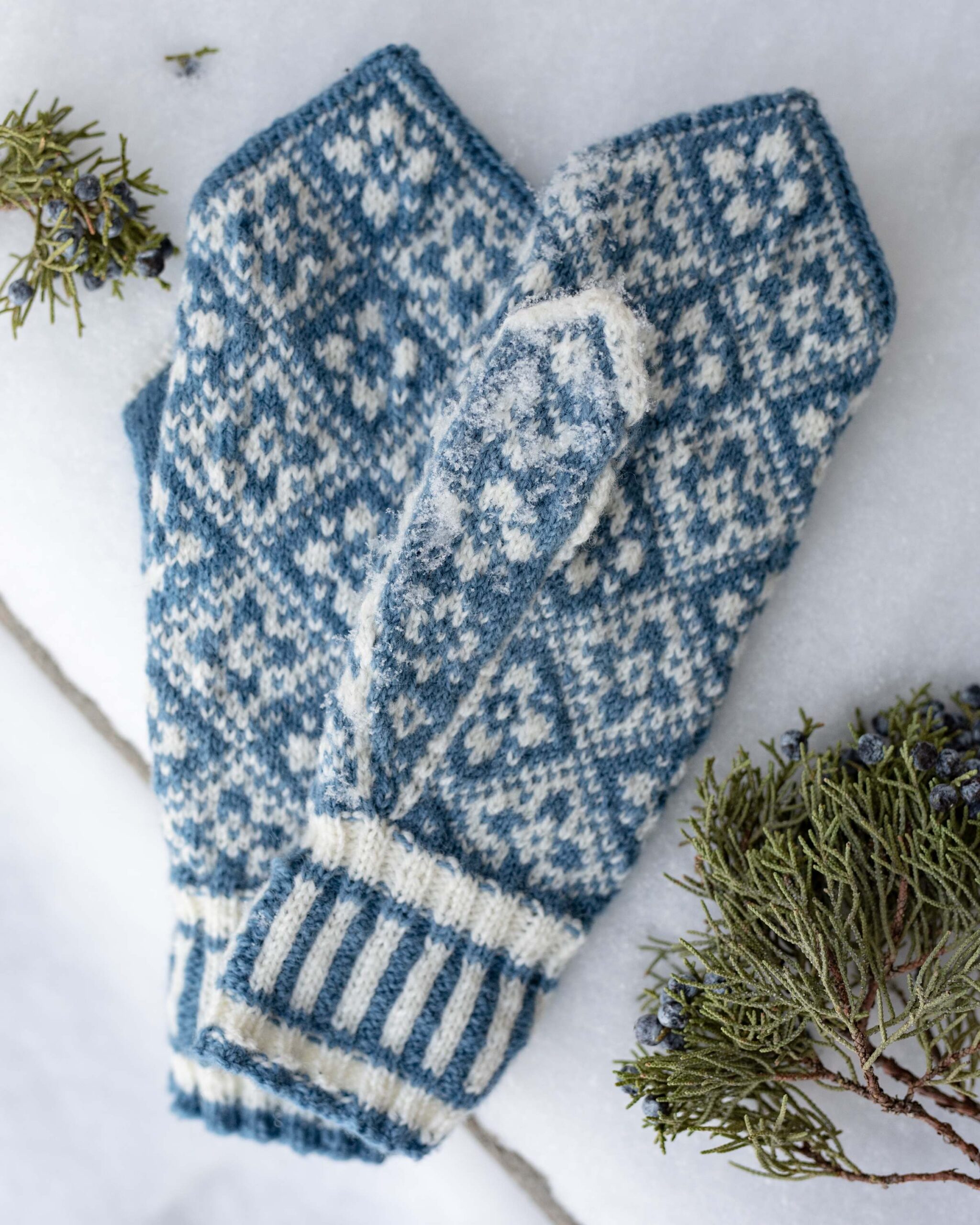 Handmade Blue and White Knit Mittens with Nordic Pattern Winter Accessories artist reference photo