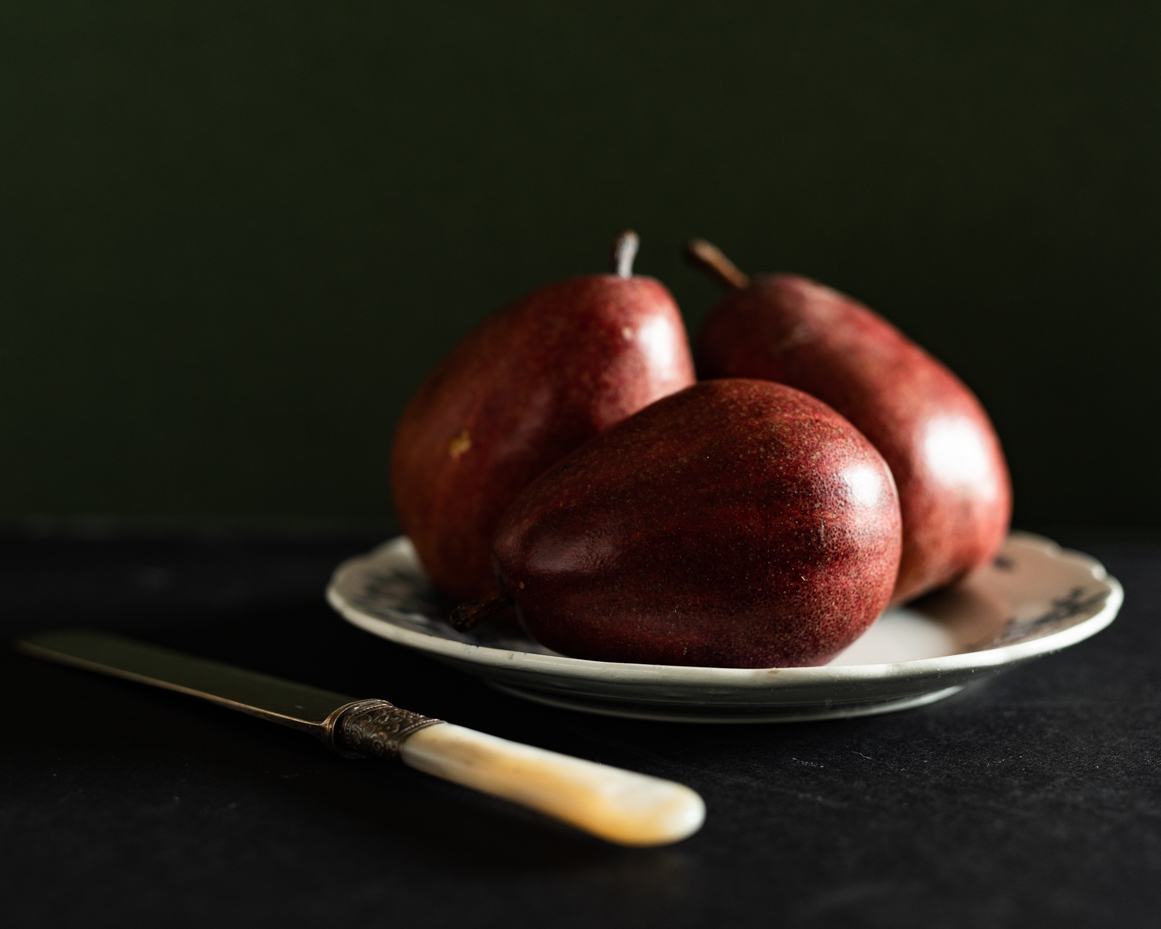 red-pears-on-vintage-plate-with-knife-artist-reference-photo