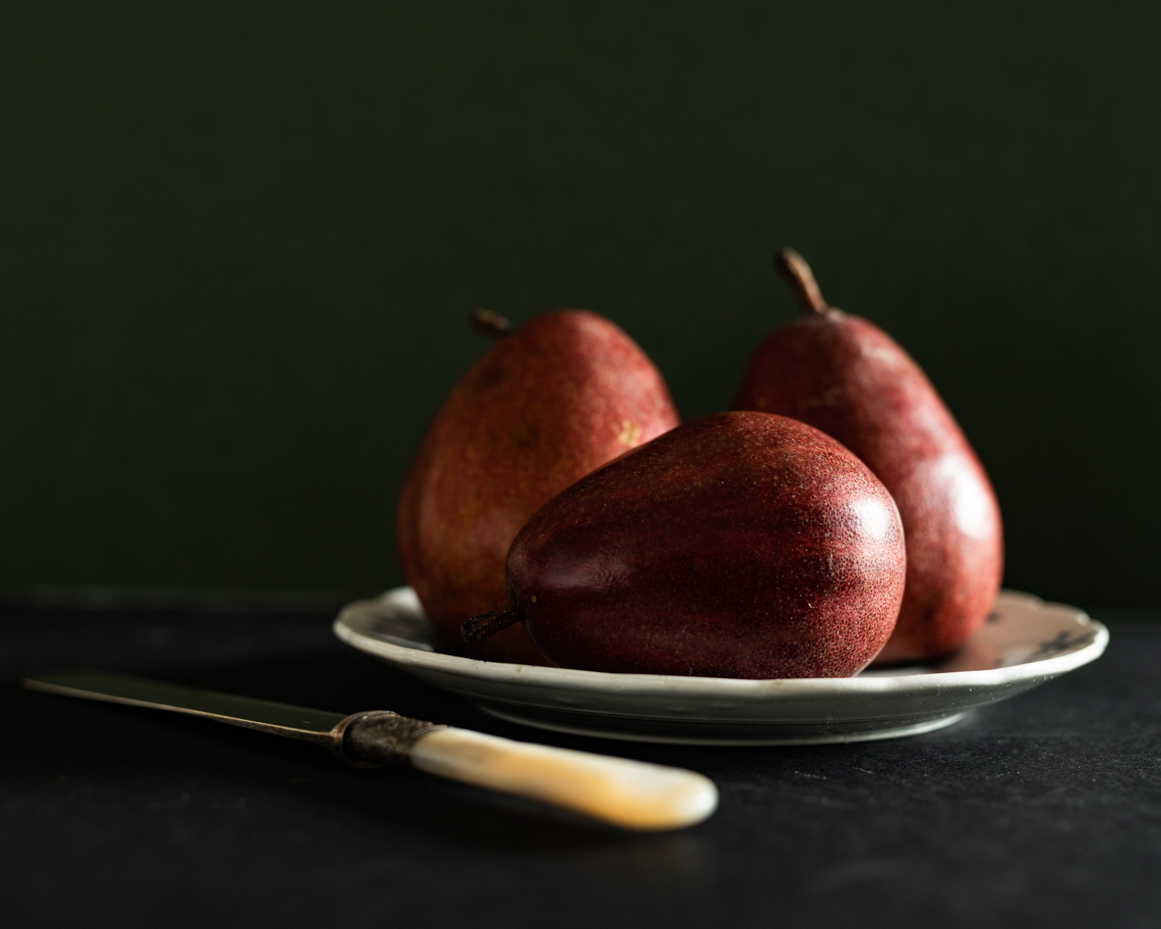 still-life-with-red-pears-and-vintage-knife-on-dark-background-artist-reference-photo