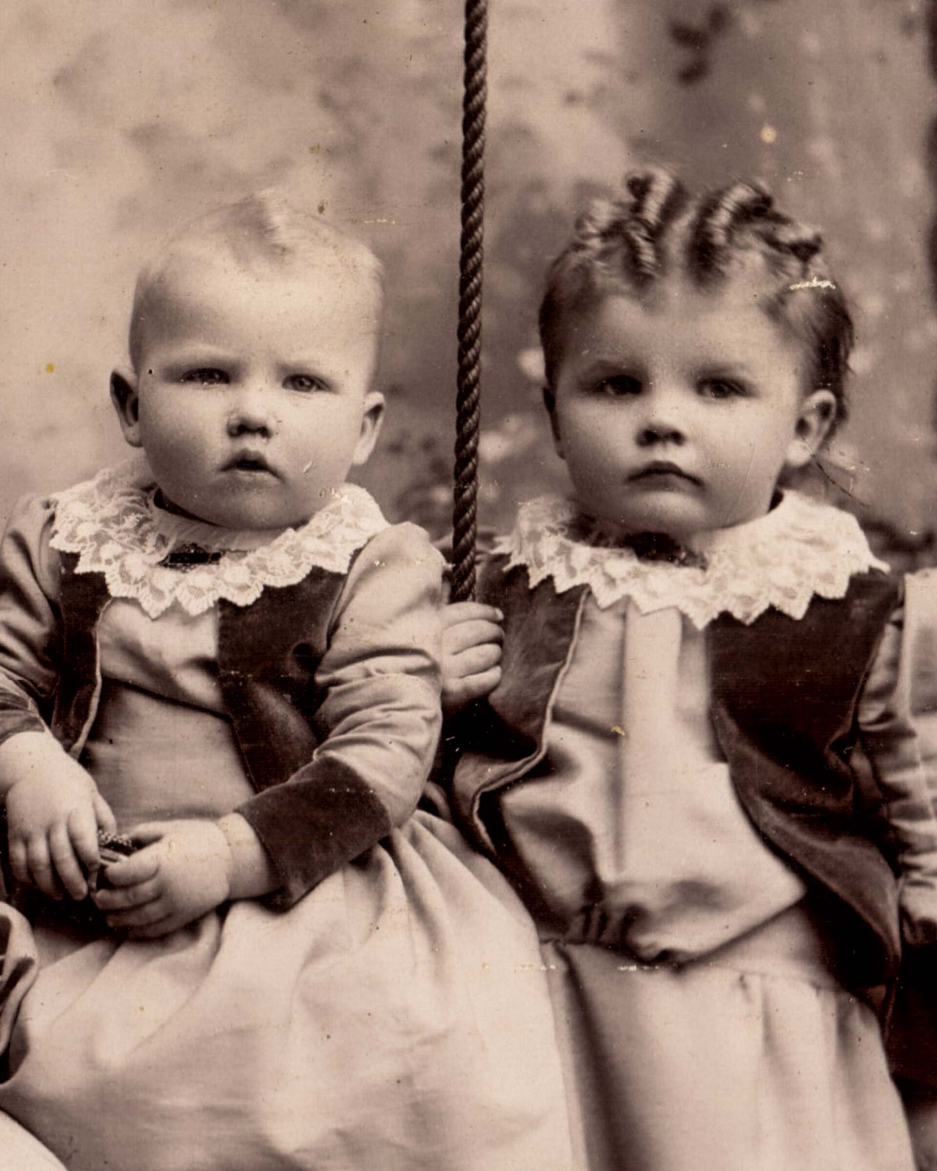 victorian-siblings-portrait-of-two-young-children-in-lace-collar-dresses-1890s-vintage-photography