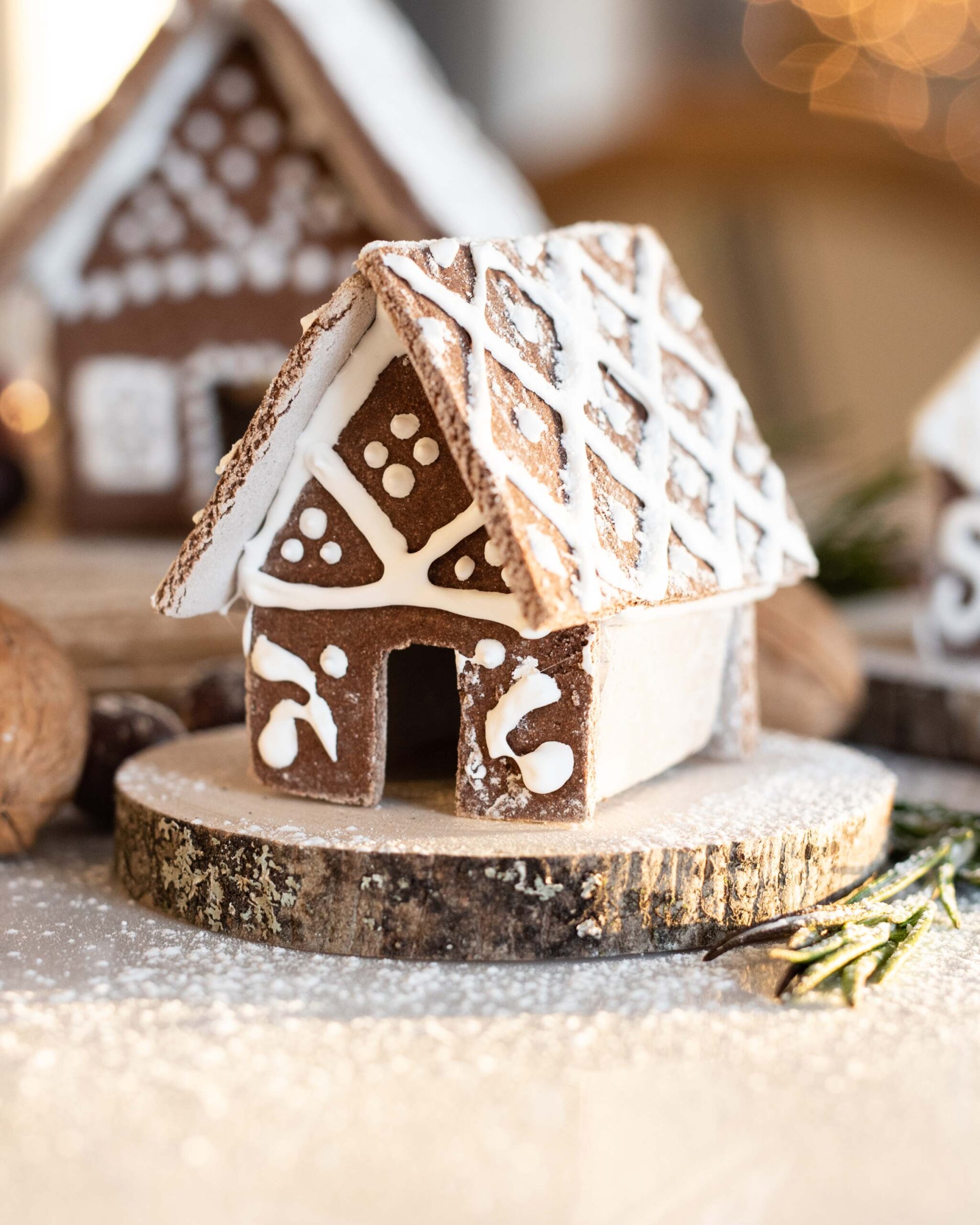 Whimsical Gingerbread House with Icing Details on Rustic Pedestal artist reference photo