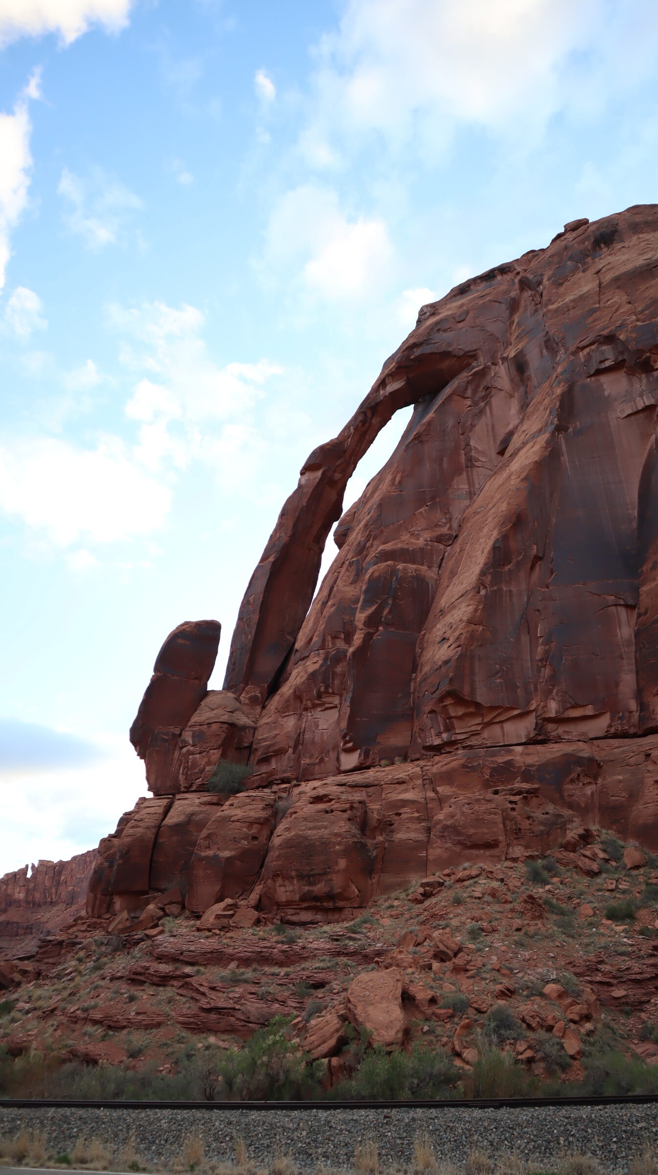 natural-rock-arch-formation-against-blue-sky-in-desert-landscape