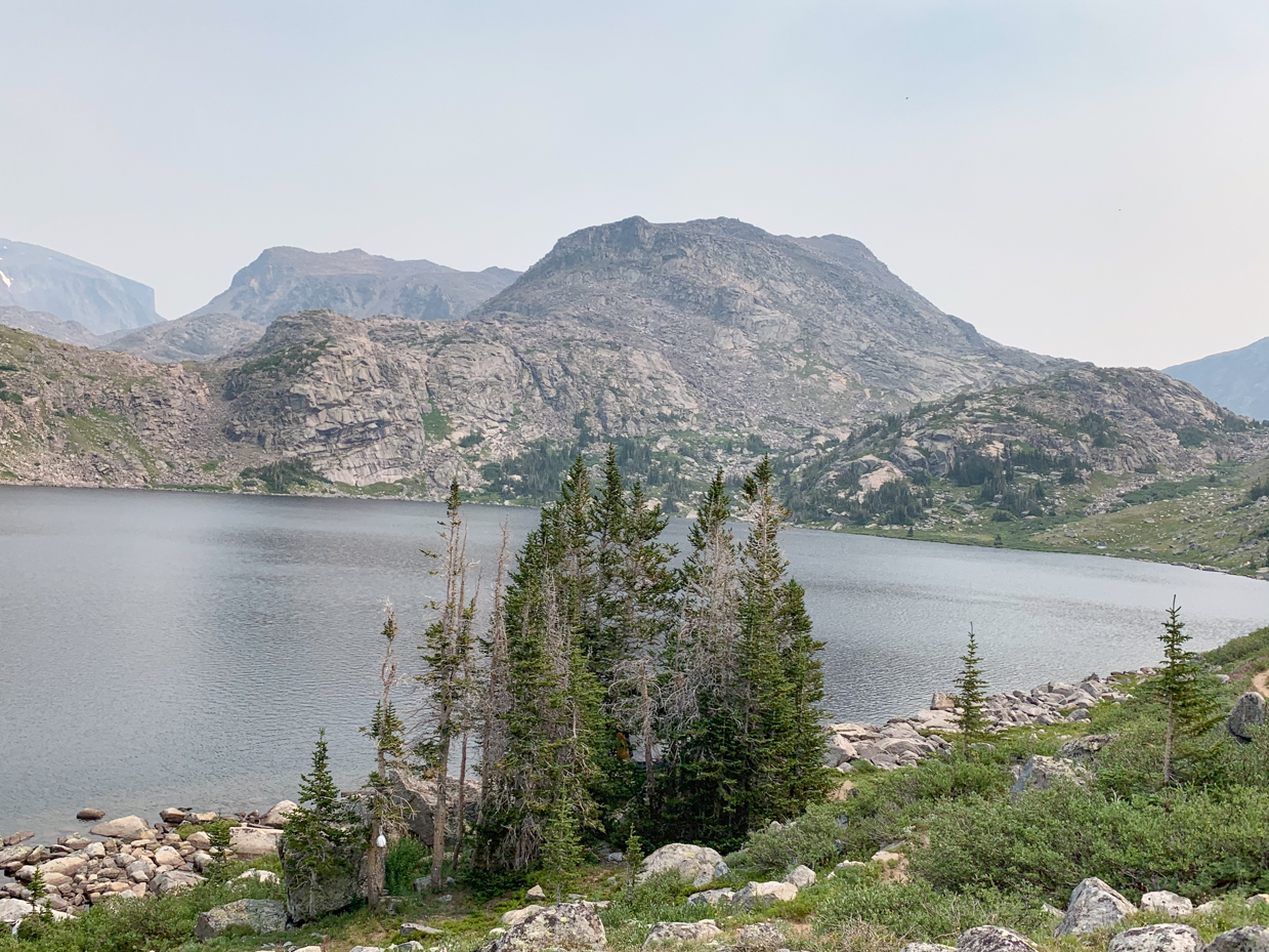 alpine-lake-with-rugged-mountain-backdrop-serene-wilderness-landscape-artist-reference-photo