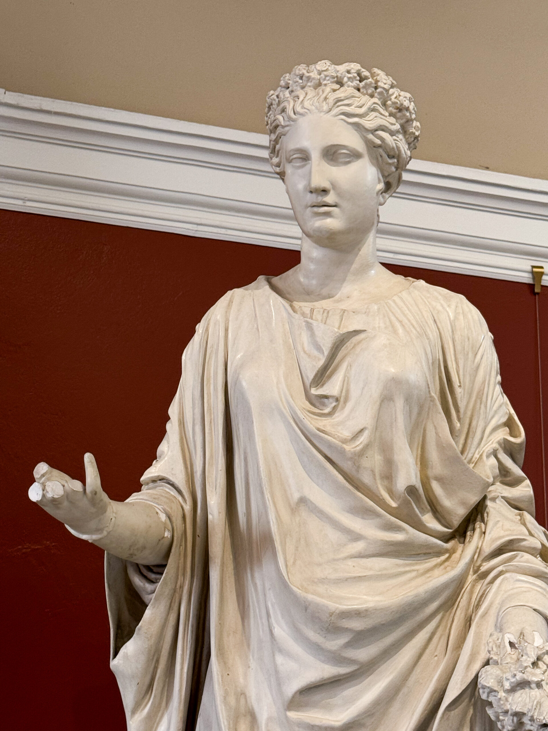 ancient-roman-marble-statue-of-a-woman-with-flowing-drapery-and-detailed-hairstyle