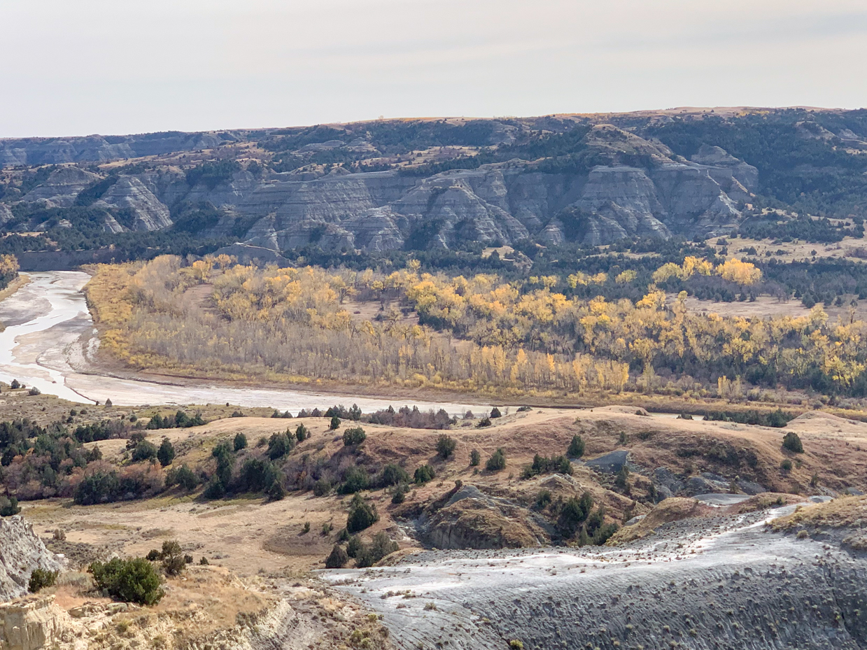 autumn-badlands-river-valley-with-eroded-cliffs-western-landscape-artist-reference-photo