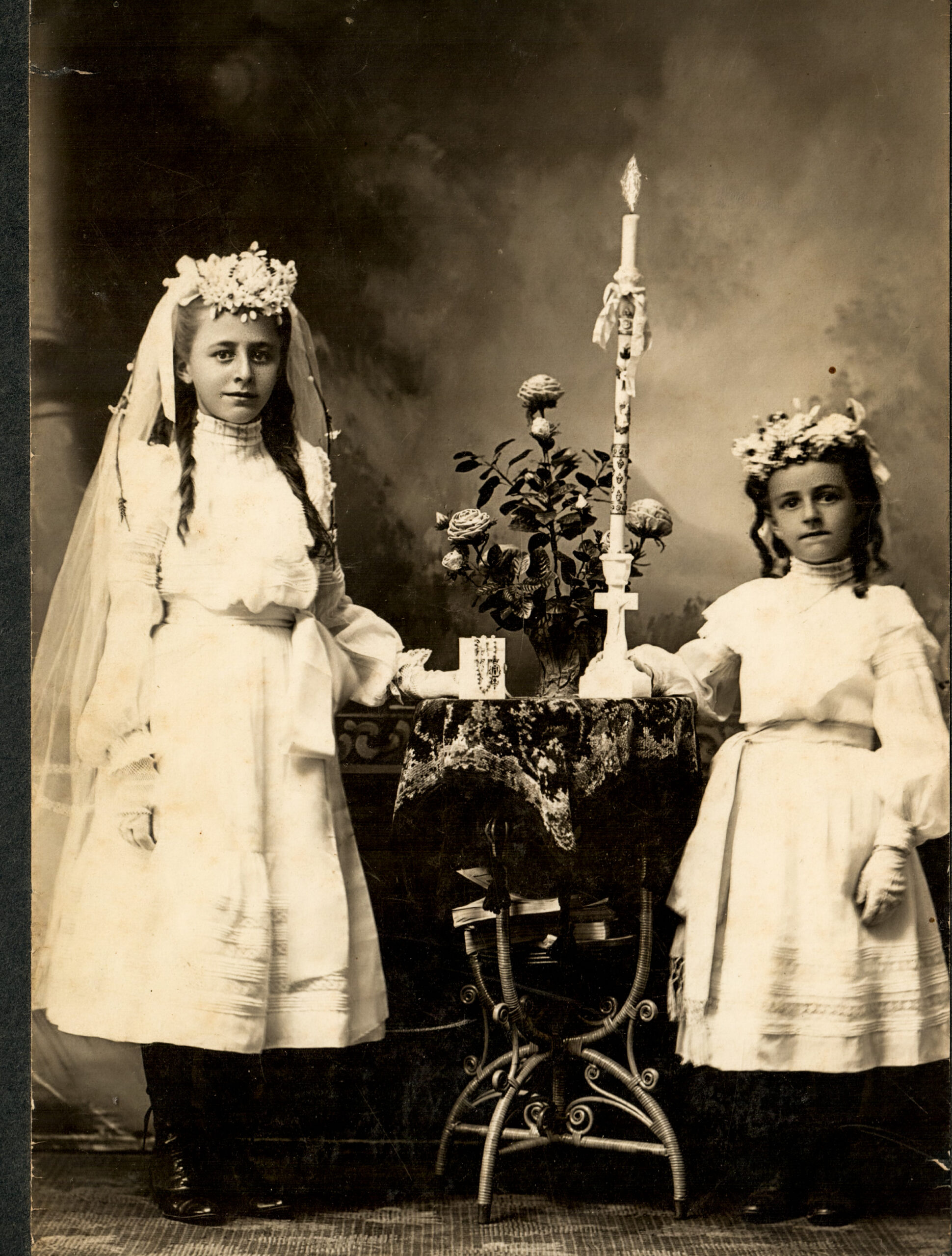 First Communion Portrait of Two Young Girls with Veils, Flowers, and Candle artist reference photo