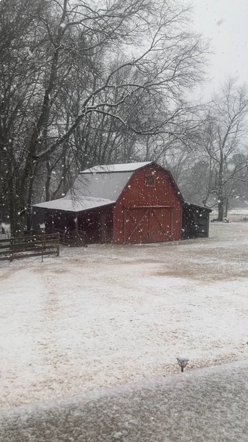 red-barn-in-the-snow