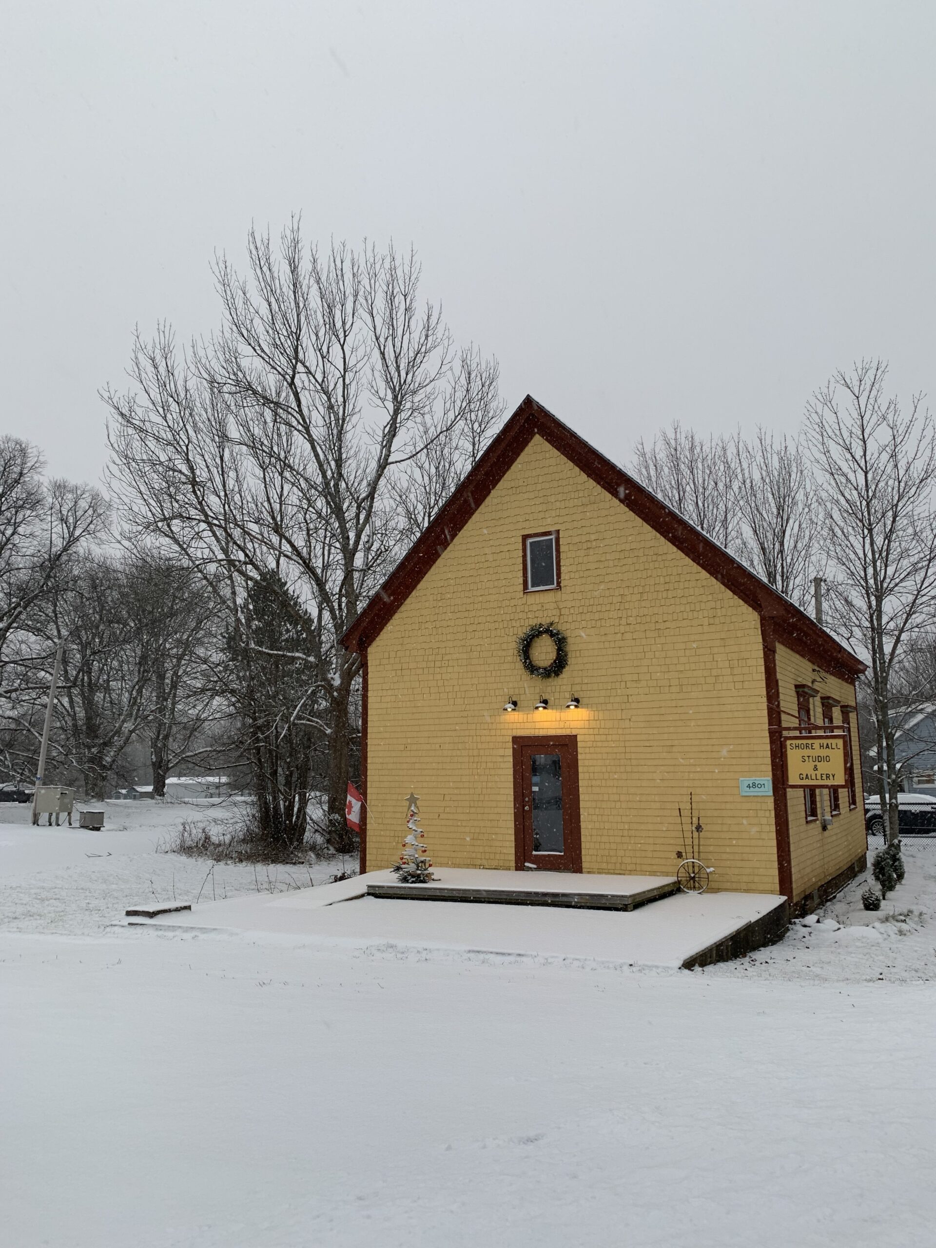 wintry-landscape-snow-yellow-building