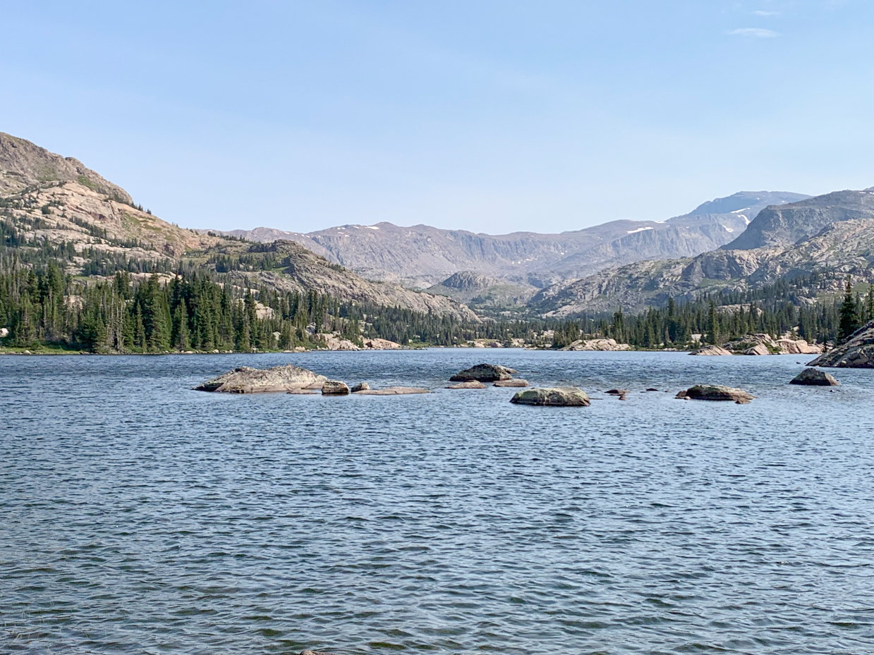 pristine-mountain-lake-with-granite-boulders-scenic-alpine-wilderness-artist-reference-photo