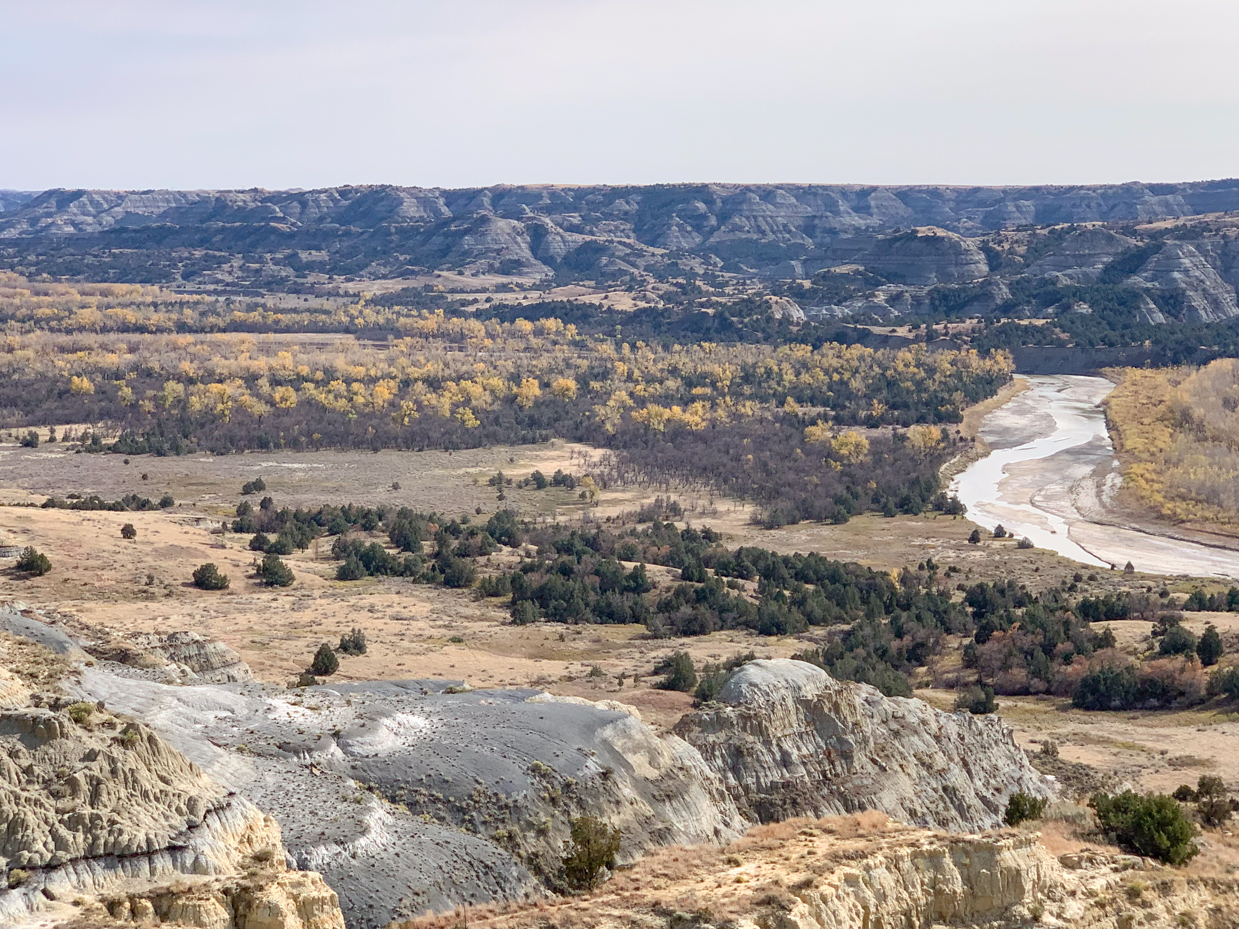 rugged-badlands-panorama-with-winding-river-western-landscape-artist-reference-photo-jpg