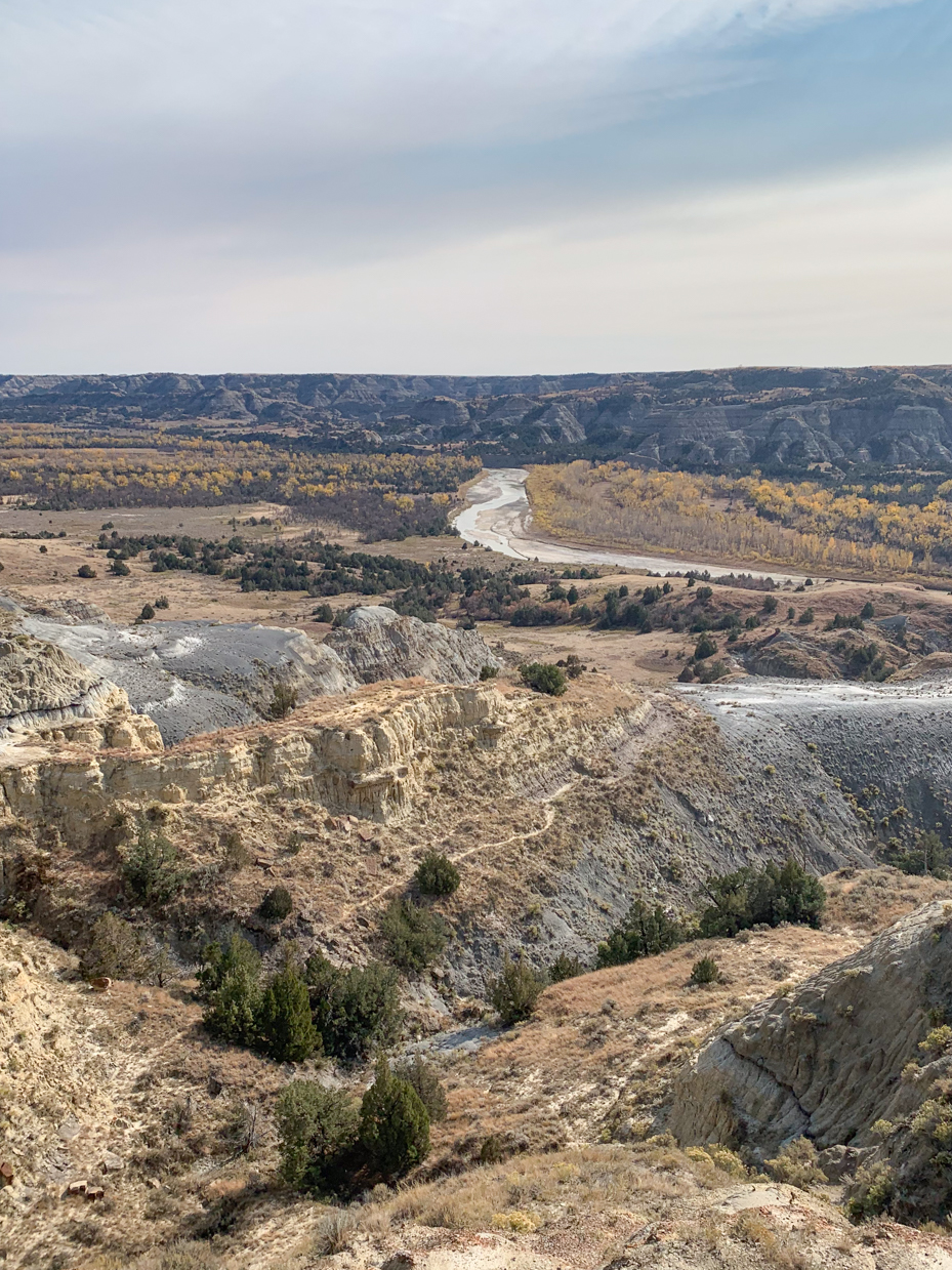 rugged-badlands-terrain-with-meandering-river-western-landscape-artist-reference-photo