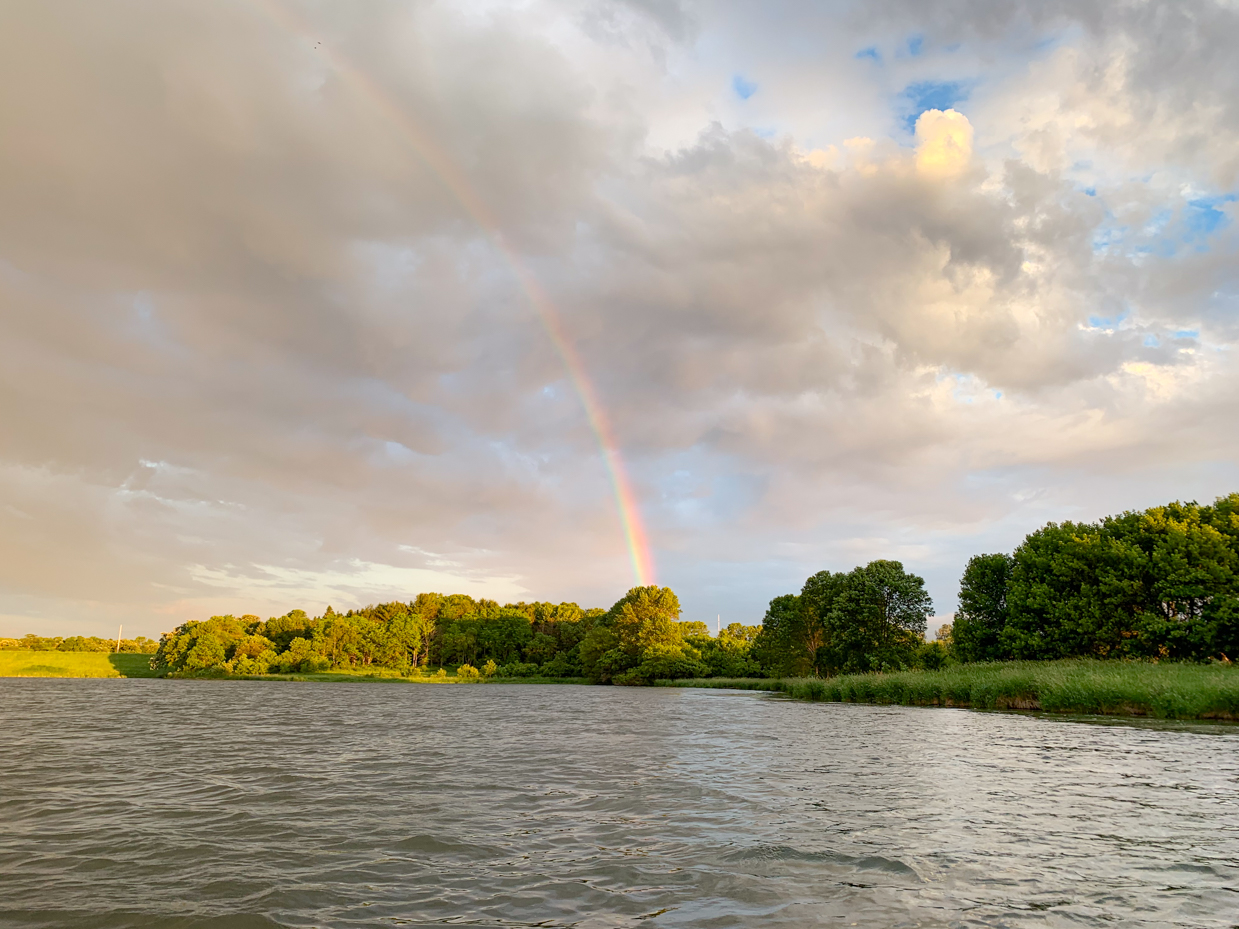 serene-lake-view-with-a-vibrant-rainbow-after-the-rain-nature-photography