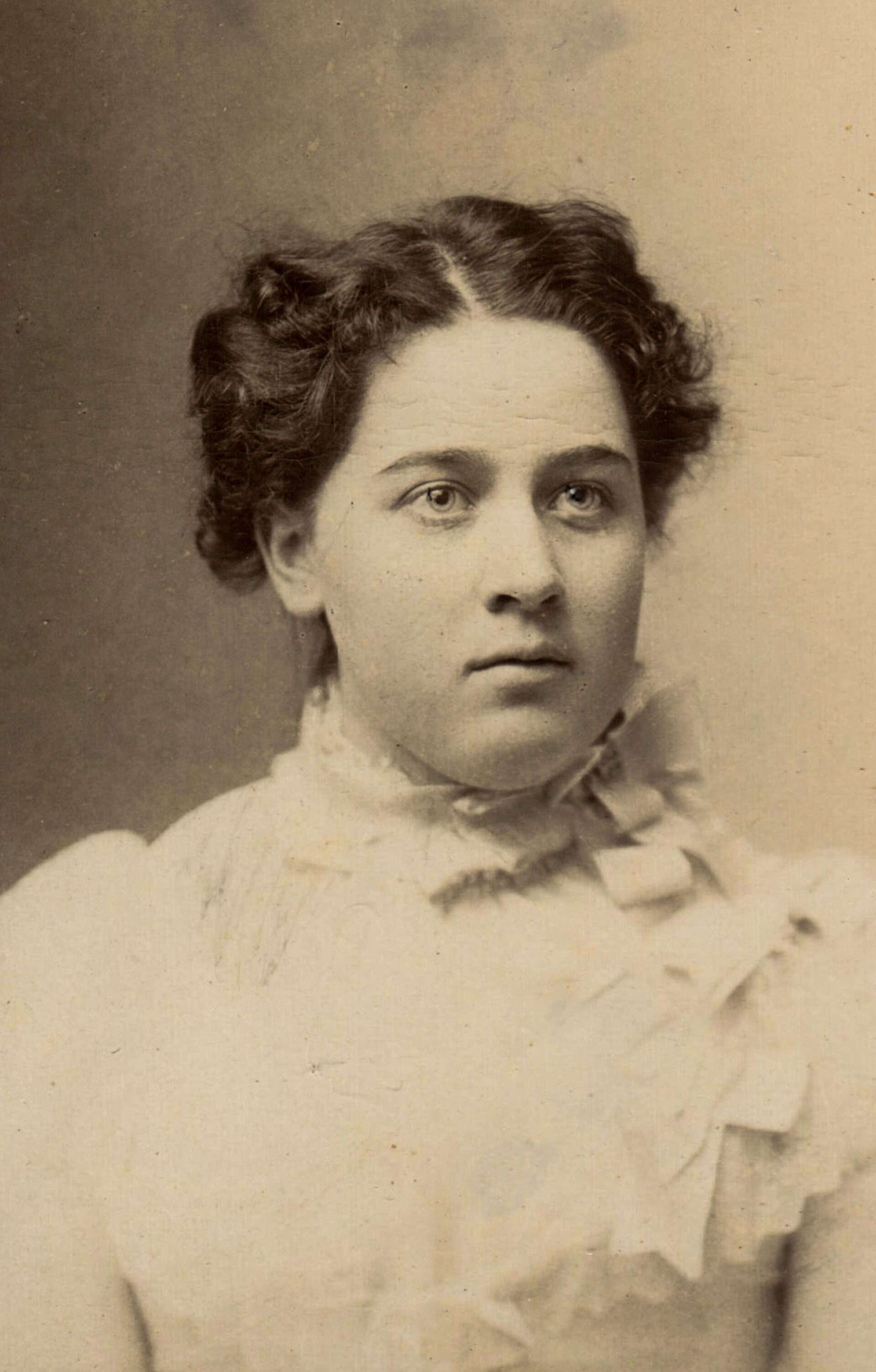 portrait-of-a-woman-in-white-shirt