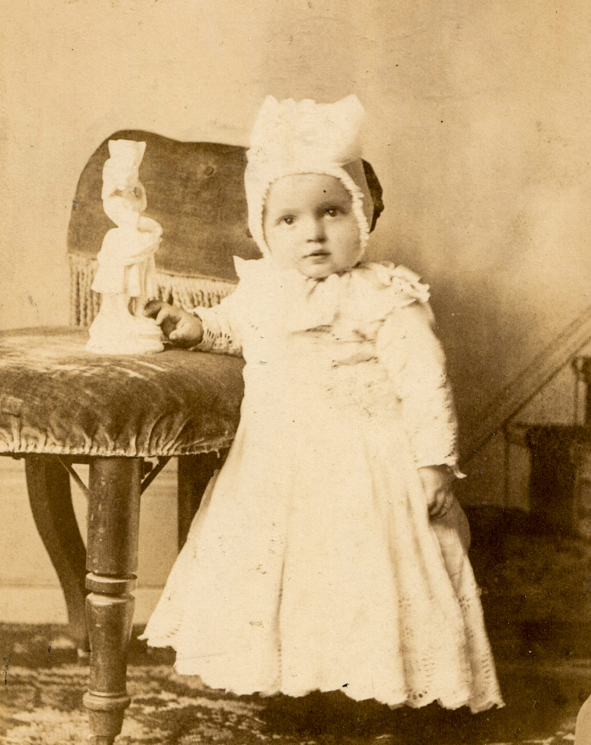baby with large bow and doll artist reference photo