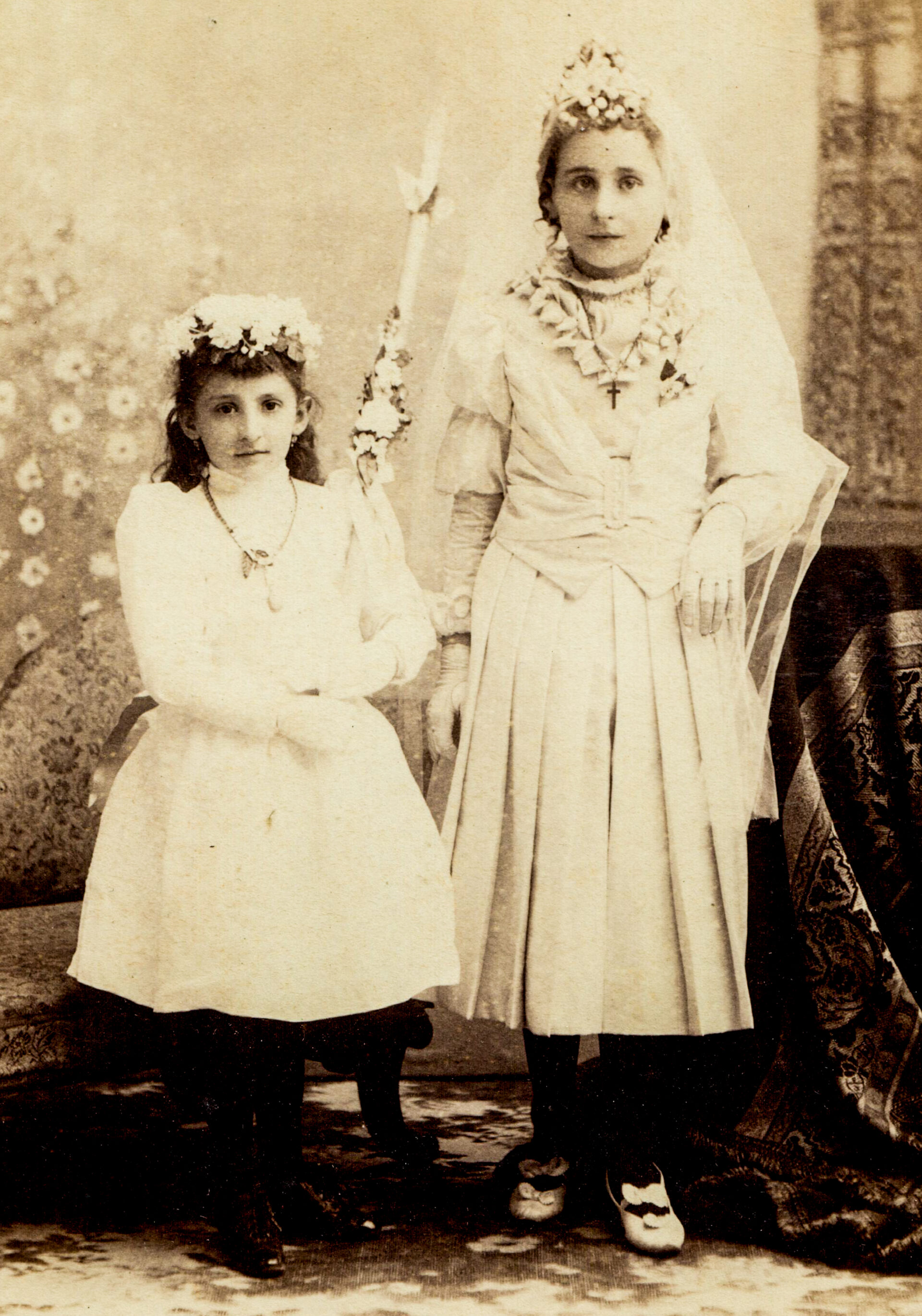 portrait-of-two-girls-in-white-dresses