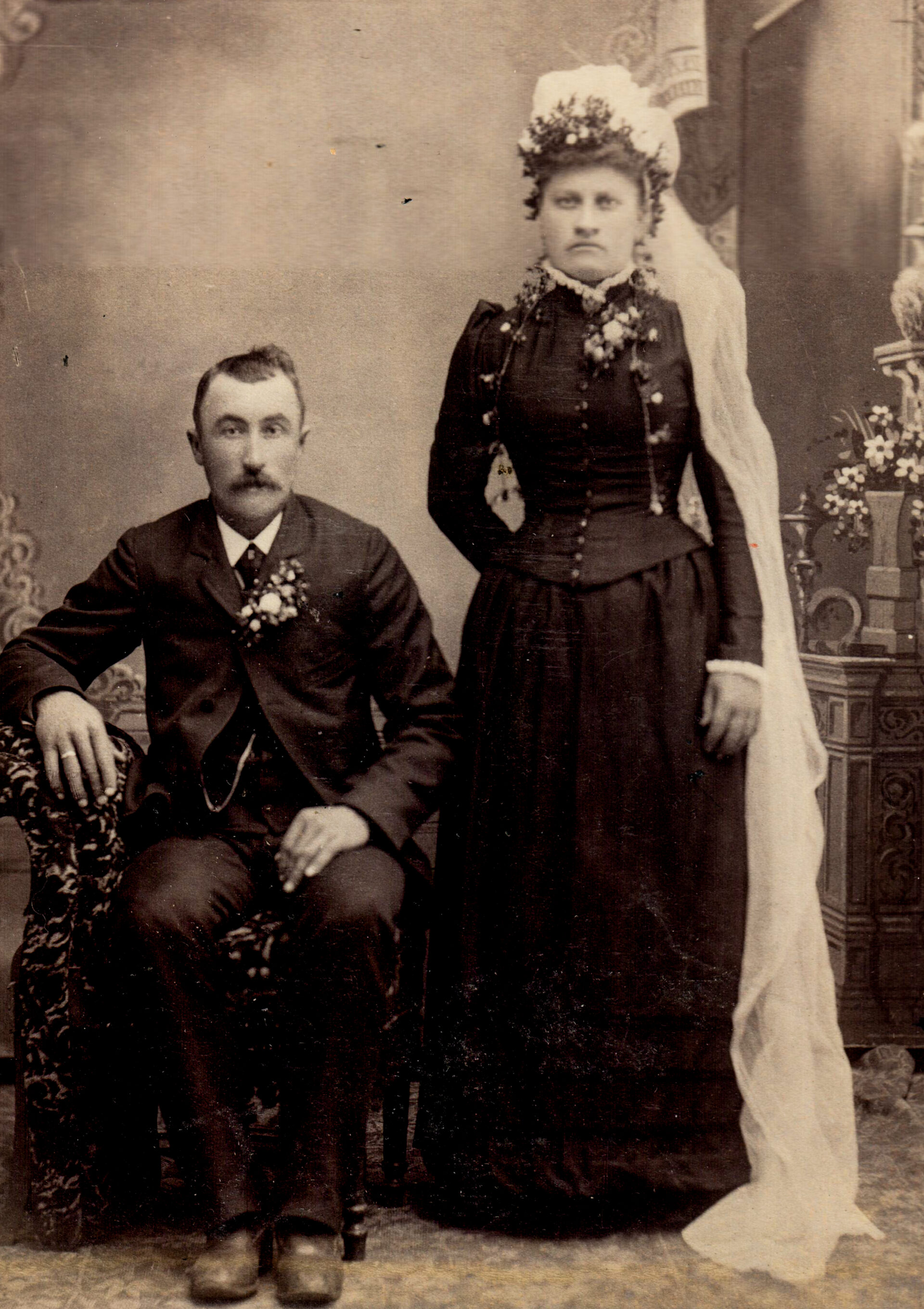 portrait-of-couple-bride-groom-in-black