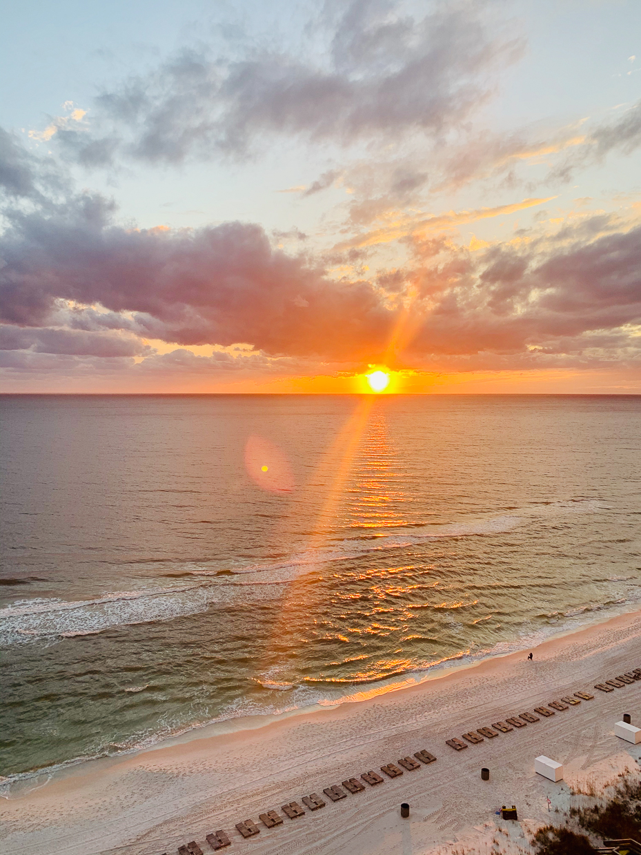 golden-sunset-over-ocean-waves-with-vibrant-sky-and-sandy-beach-coastal-bliss