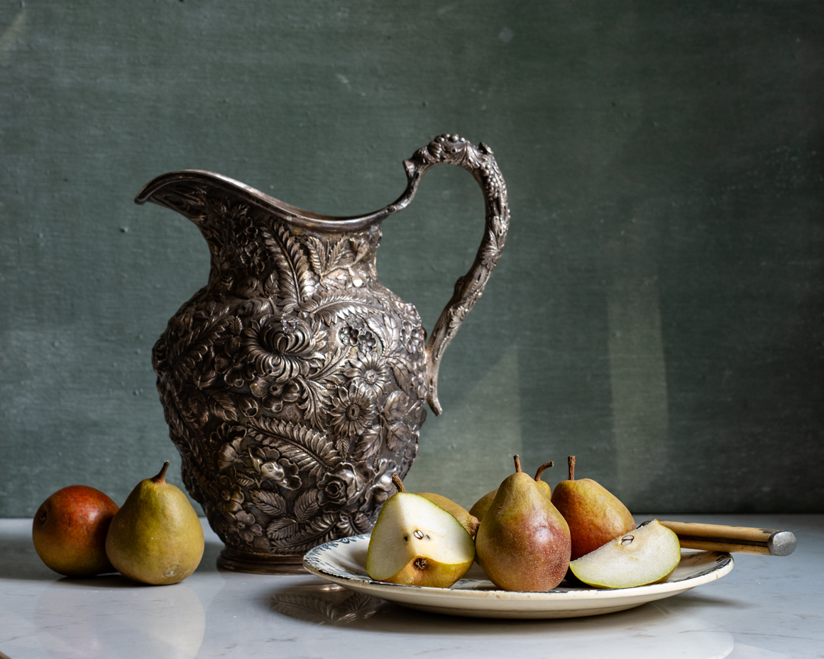 ornate-silver-pitcher-with-pears-on-ceramic-plate-artist-reference-photo