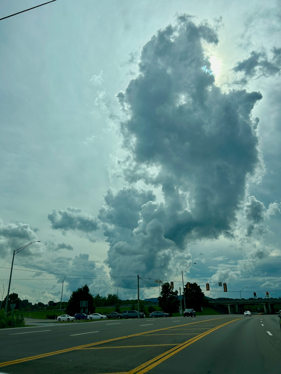 towering-storm-cloud-over-highway-intersection-artist-reference-photo
