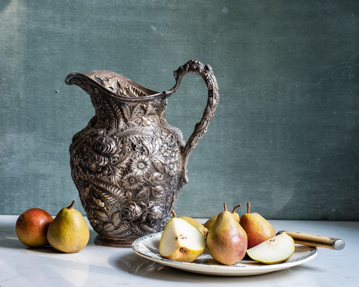vintage-silver-pitcher-with-sliced-pears-on-marble-table-artist-reference-photo