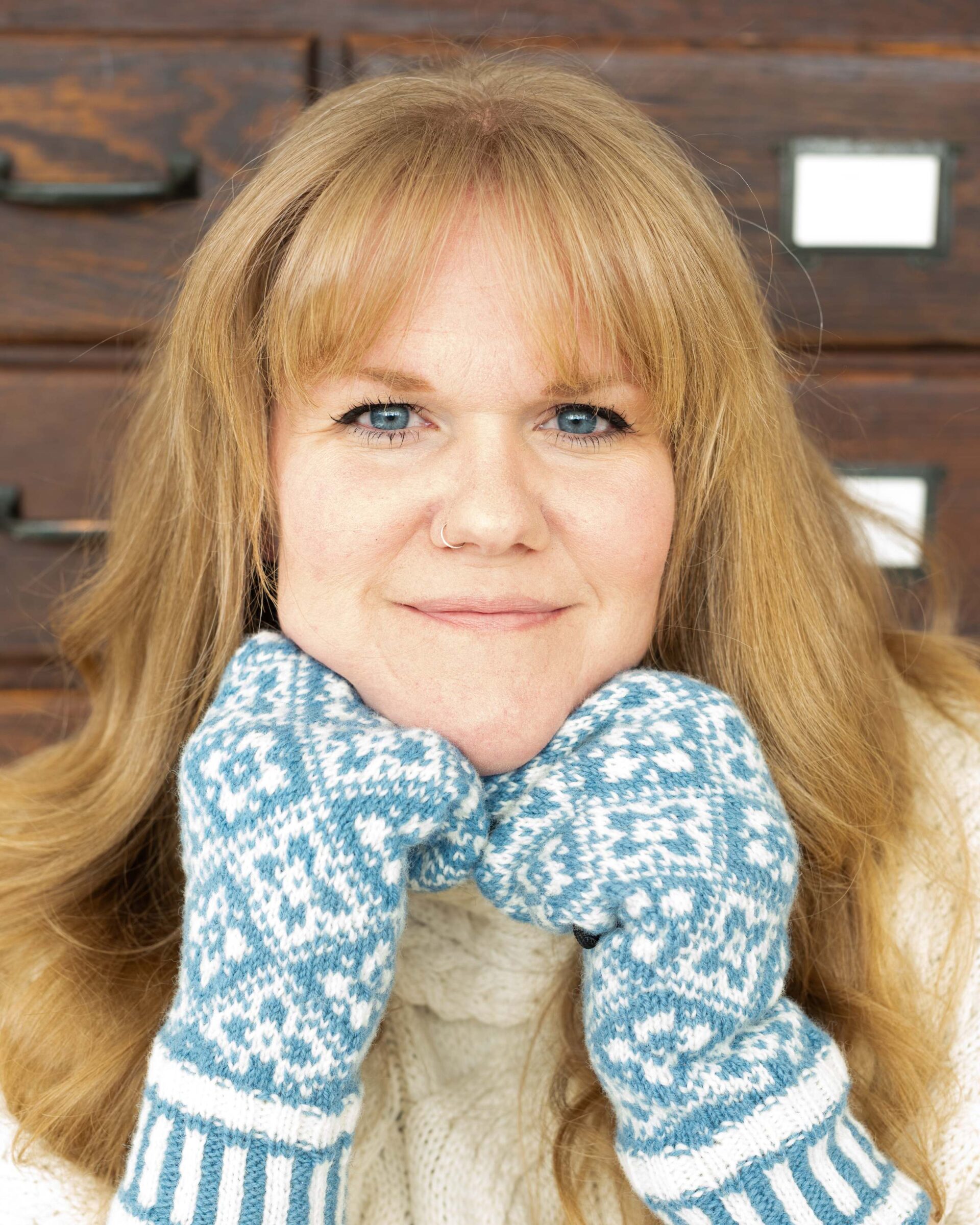 woman-with-blonde-hair-in-fair-isle-mittens-and-cream-sweater-artist-reference-photo