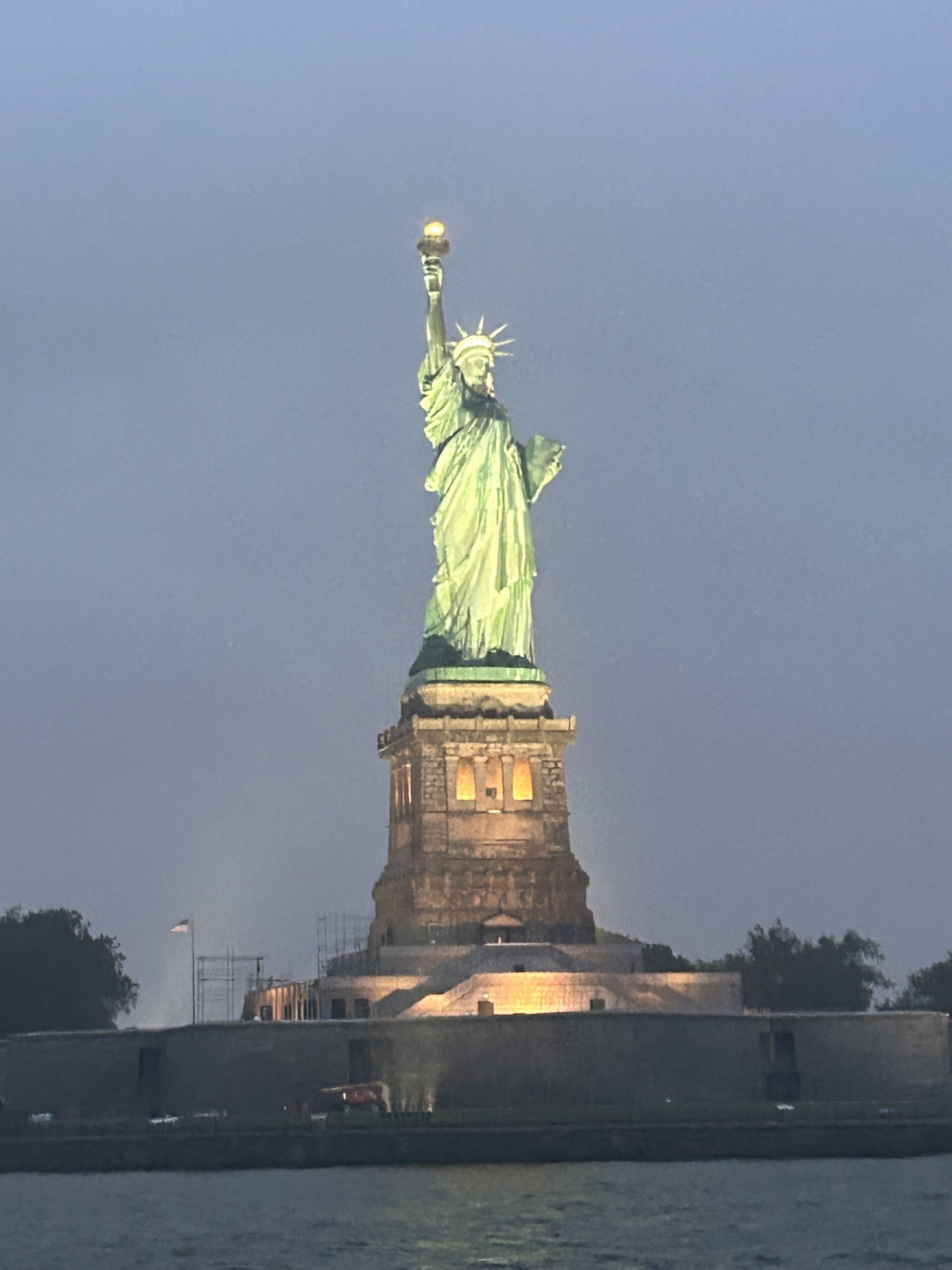 Statue of Liberty Illuminated at Night with Cloudy Sky Artist Reference Photo artist reference photo