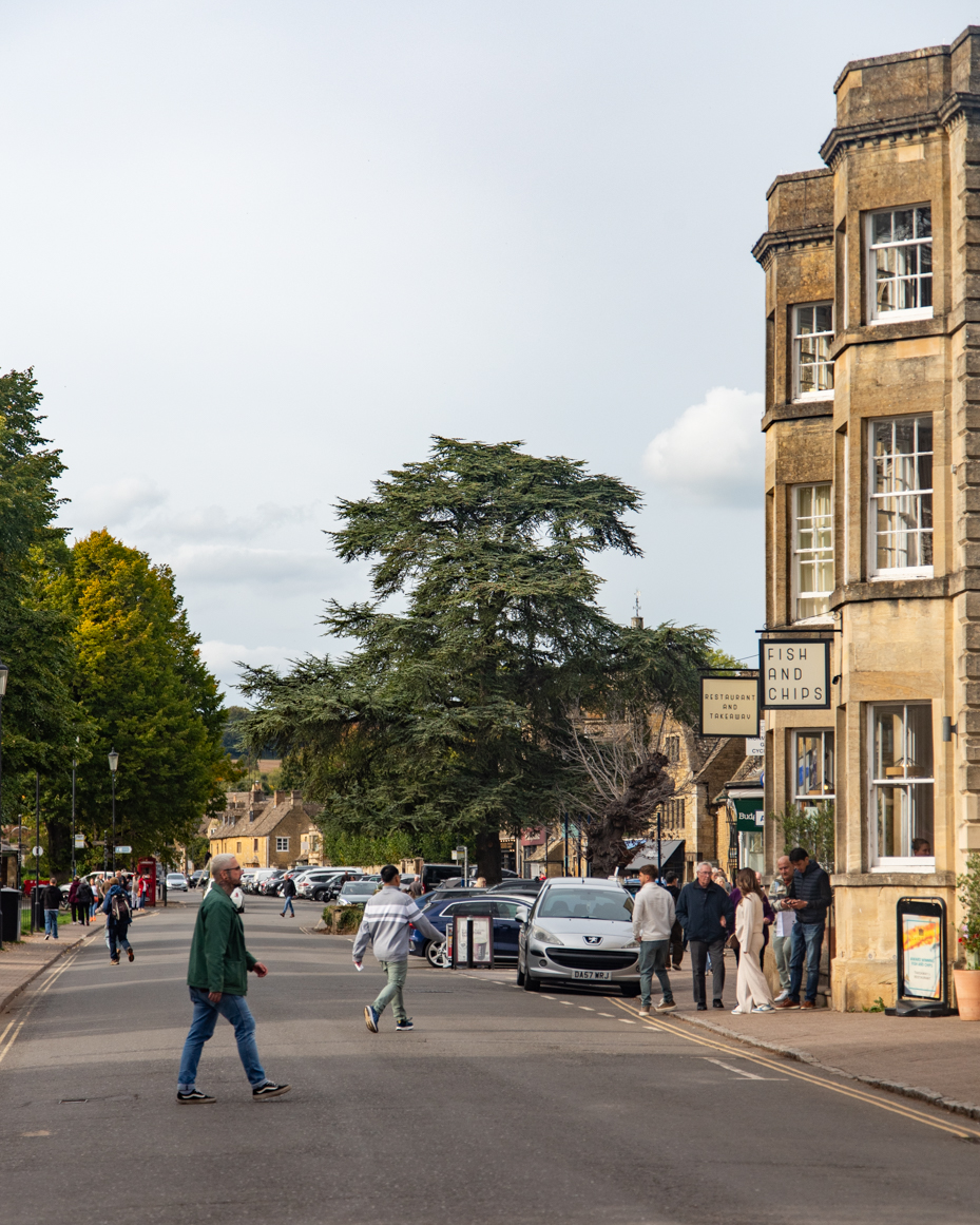 English market town street with pedestrians and stone buildings artist reference photo artist reference photo