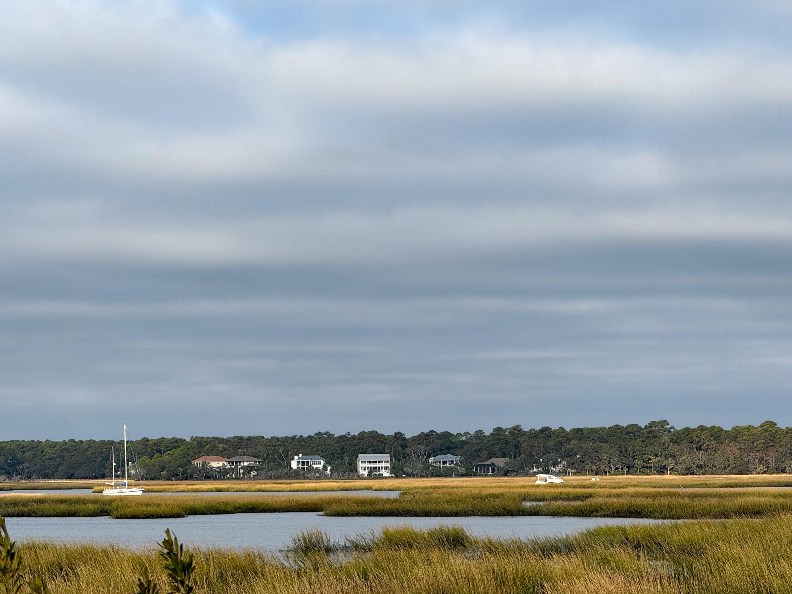 sailboat and marsh landscape with coastal homes and cloudy sky artist reference photo